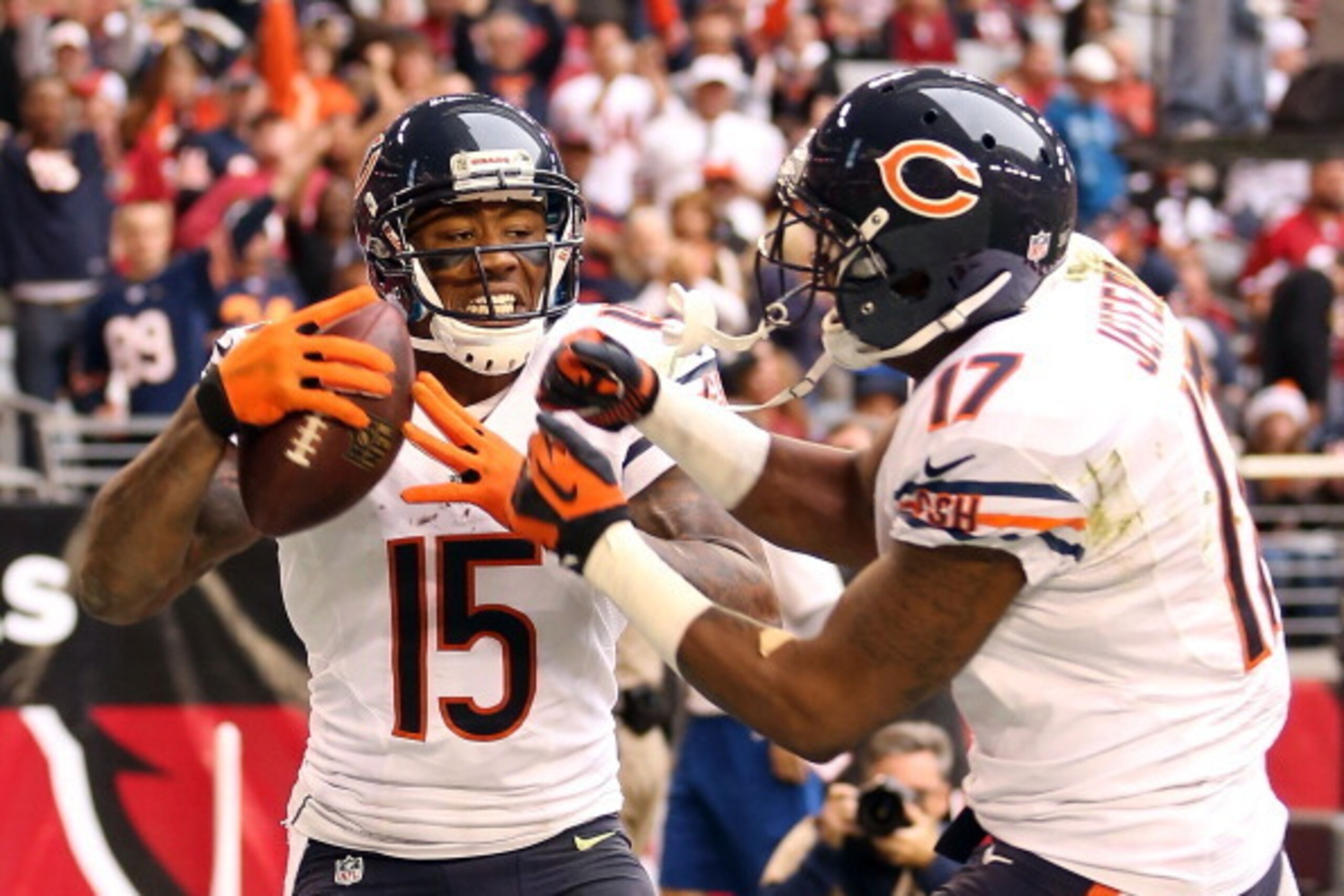 GLENDALE, AZ - DECEMBER 23:  Wide receiver Brandon Marshall #15 of the Chicago Bears celebrates with wide receiver Alshon Jeffery #17 after a 11 yard touchdown reception against the Arizona Cardinals during the second quarter of the NFL game at the Univer