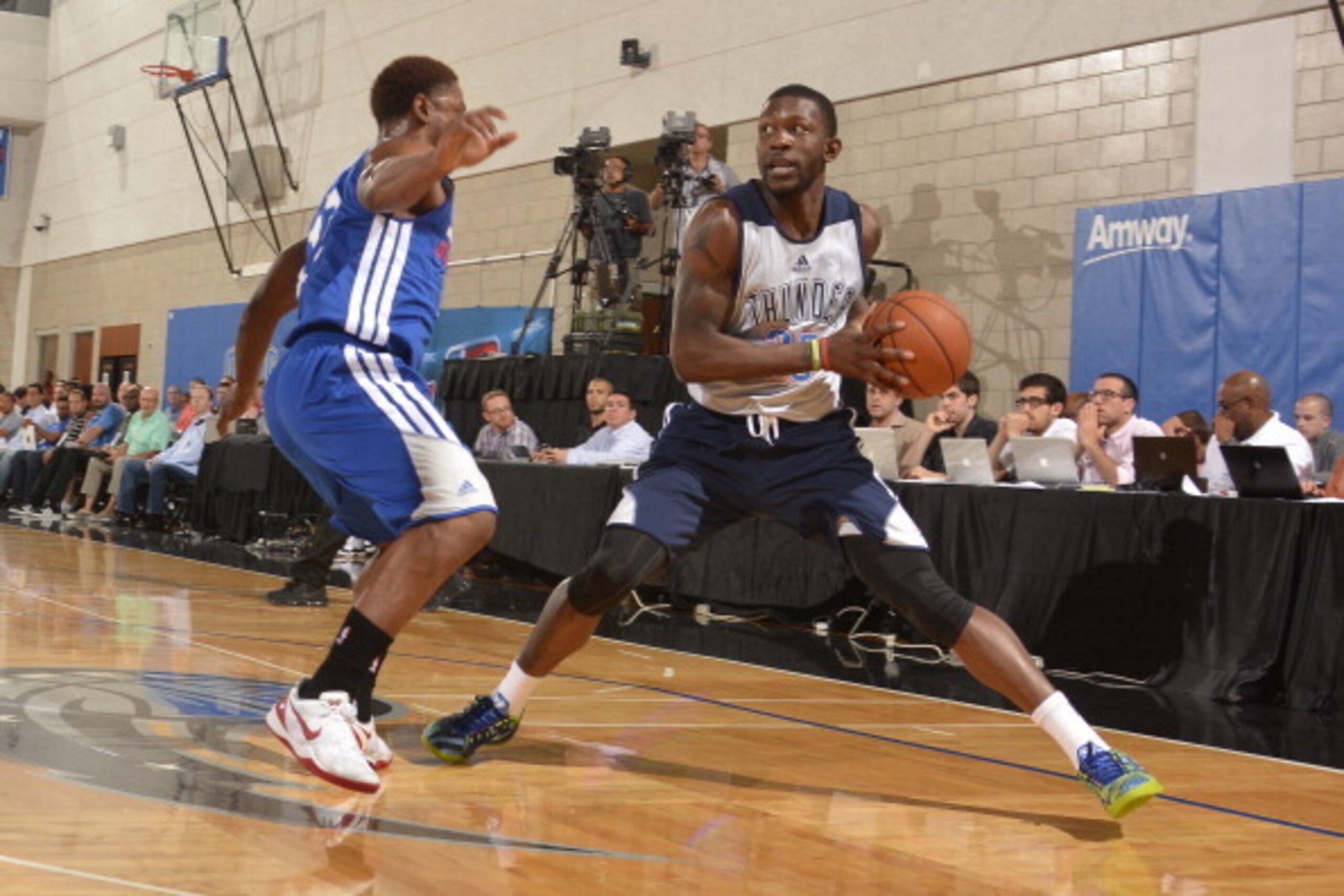 ORLANDO, FL - JULY 6:  Mario Little #23 of the Oklahoma City Thunder handles the ball against the Philadelphia 76ers on July 6, 2014 at Amway Center in Orlando, Florida. NOTE TO USER: User expressly acknowledges and agrees that, by downloading and or usin
