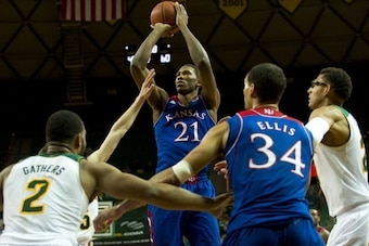 WACO, TX - FEBRUARY 04: Joel Embiid #21 of the Kansas Jayhawks shoots the ball over the Baylor Bears on February 4, 2014 at the Ferrell Center in Waco, Texas.  (Photo by Cooper Neill/Getty Images)