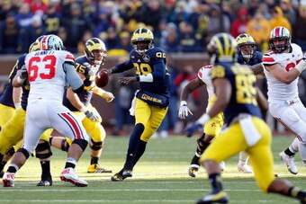 ANN ARBOR, MI - NOVEMBER 30: Quarterback Devin Gardner #98 of the Michigan Wolverines looks to pass against the Ohio State Buckeyes during a game at Michigan Stadium on November 30, 2013 in Ann Arbor, Michigan.  (Photo by Gregory Shamus/Getty Images)