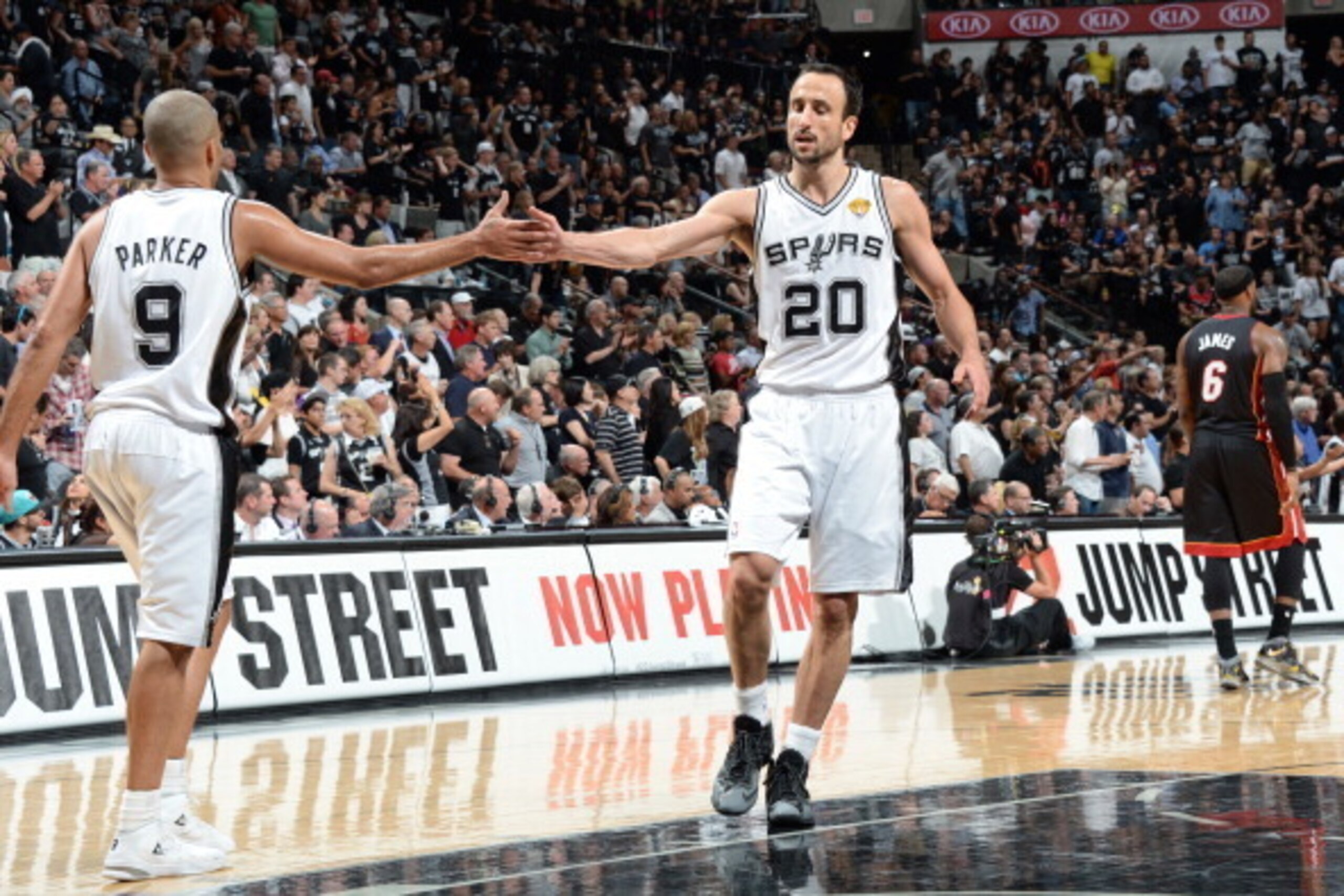 SAN ANTONIO, TX - JUNE 15: Tony Parker #9 and Manu Ginobili #20 of the San Antonio Spurs high five during Game Five of the 2014 NBA Finals between the Miami Heat and San Antonio Spurs at AT&T Center on June 15, 2014 in San Antonio, Texas. NOTE TO USER: Us SAN ANTONIO, TX - JUNE 15: Tony Parker #9 and Manu Ginobili #20 of the San Antonio Spurs high five during Game Five of the 2014 NBA Finals between the Miami Heat and San Antonio Spurs at AT&T Center on June 15, 2014 in San Antonio, Texas. NOTE TO USER: Us