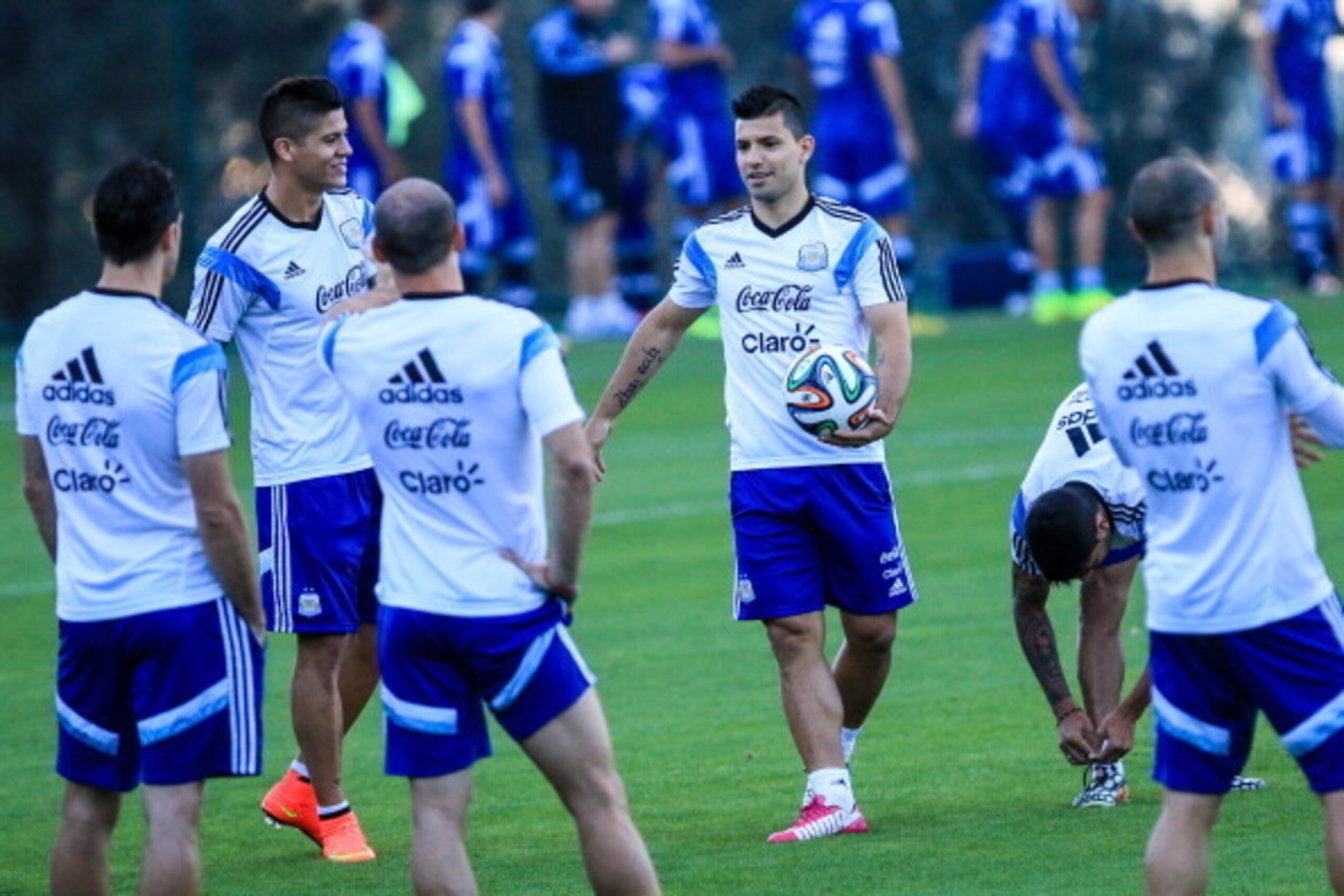 VESPASIANO, BRAZIL - JULY 06: Marcos Rojo and Sergio Aguero during the Argentina training session at Cidade do Galo on July 6, 2014 in Vespasiano, Brazil. (Photo by Netun Lima/Getty Images)