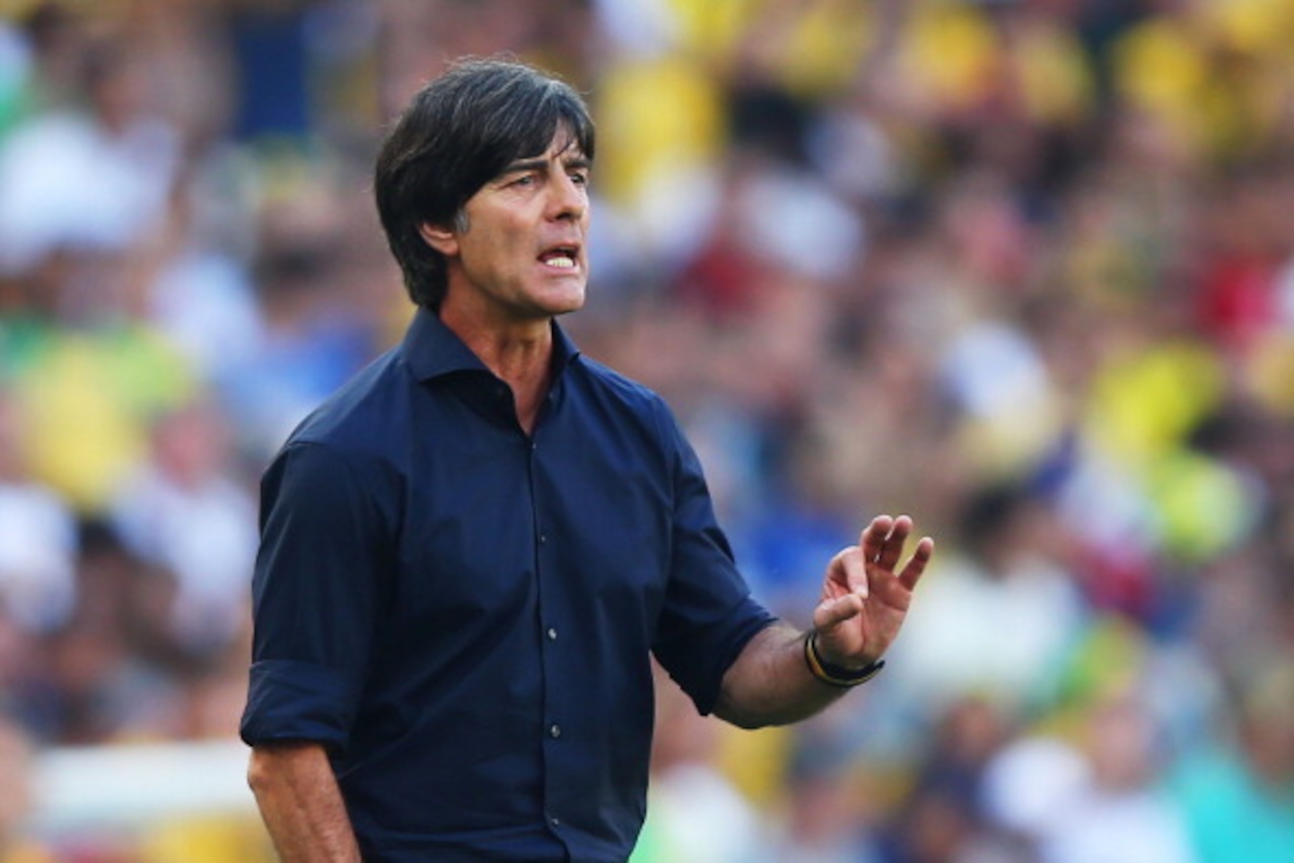 RIO DE JANEIRO, BRAZIL - JULY 04:  Head coach Joachim Loew of Germany gestures during the 2014 FIFA World Cup Brazil Quarter Final match between France and Germany at Maracana on July 4, 2014 in Rio de Janeiro, Brazil.  (Photo by Martin Rose/Getty Images)