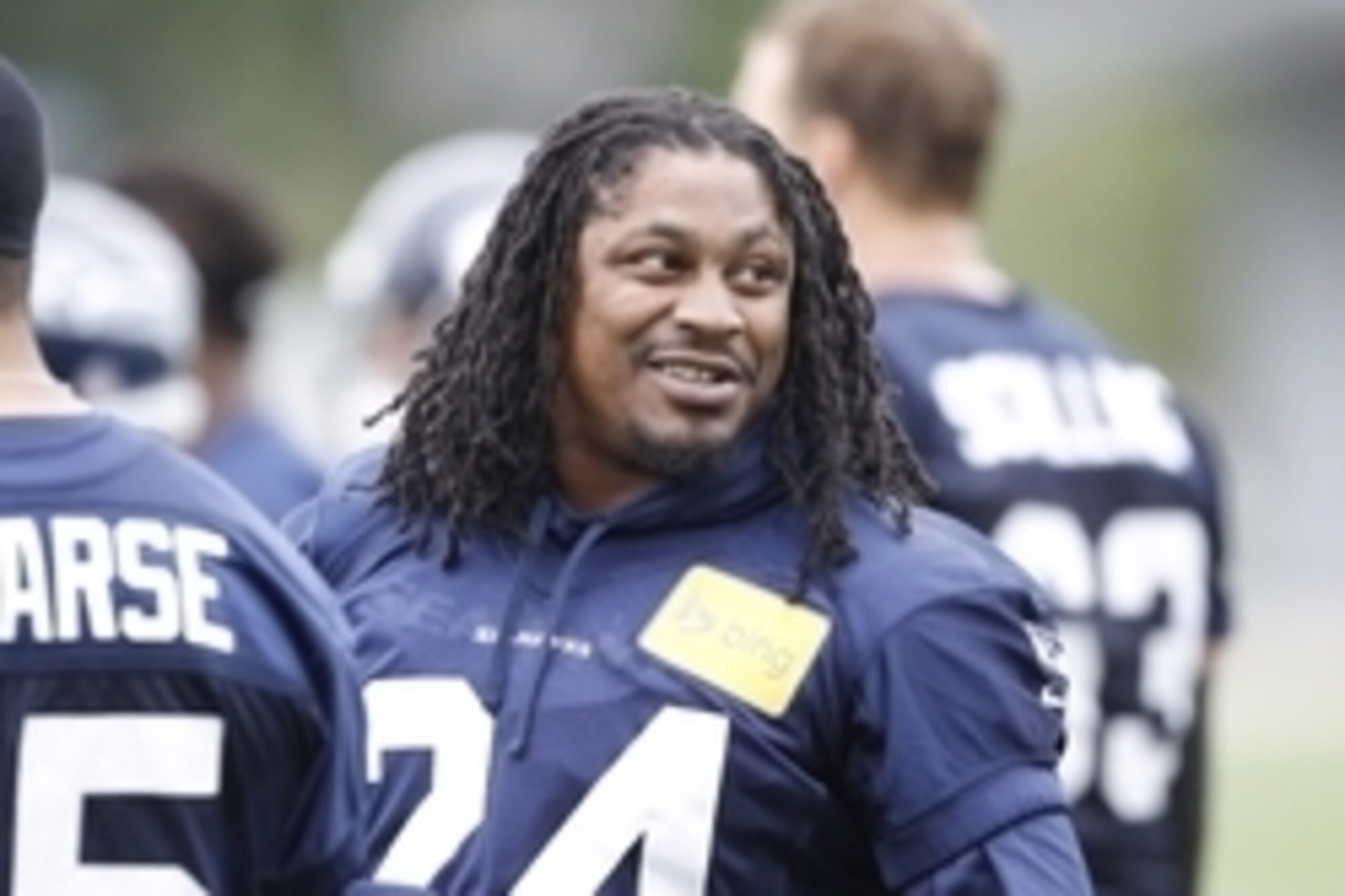 Jun 17, 2014; Renton, WA, USA; Seattle Seahawks running back Marshawn Lynch (24) talks with a teammate during minicamp at the Virginia Mason Athletic Center. Mandatory Credit: Joe Nicholson-USA TODAY Sports