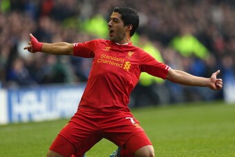 LIVERPOOL, ENGLAND - NOVEMBER 23:  Luis Suarez of Liverpool celebrates scoring his team's second goal during the Barclays Premier League match between Everton and Liverpool at Goodison Park on November 23, 2013 in Liverpool, England.  (Photo by Alex Lives