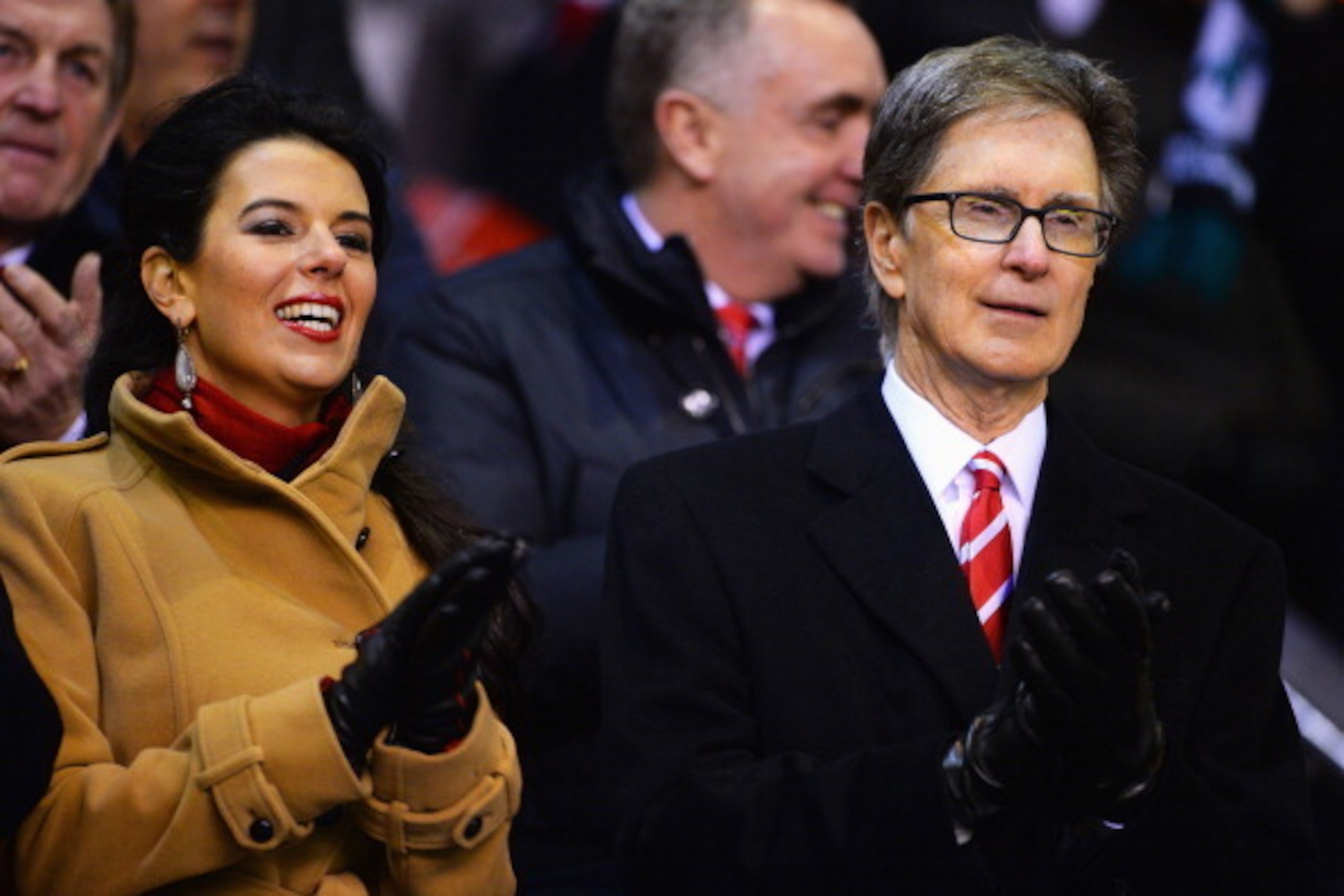 LIVERPOOL, ENGLAND - JANUARY 18: Liverpool co-owner John Henry looks on with wife Linda Pizzuti prior to the Barclays Premier League match between Liverpool and Aston Villa at Anfield on January 18, 2014 in Liverpool, England. (Photo by Michael Regan/Ge LIVERPOOL, ENGLAND - JANUARY 18: Liverpool co-owner John Henry looks on with wife Linda Pizzuti prior to the Barclays Premier League match between Liverpool and Aston Villa at Anfield on January 18, 2014 in Liverpool, England. (Photo by Michael Regan/Ge