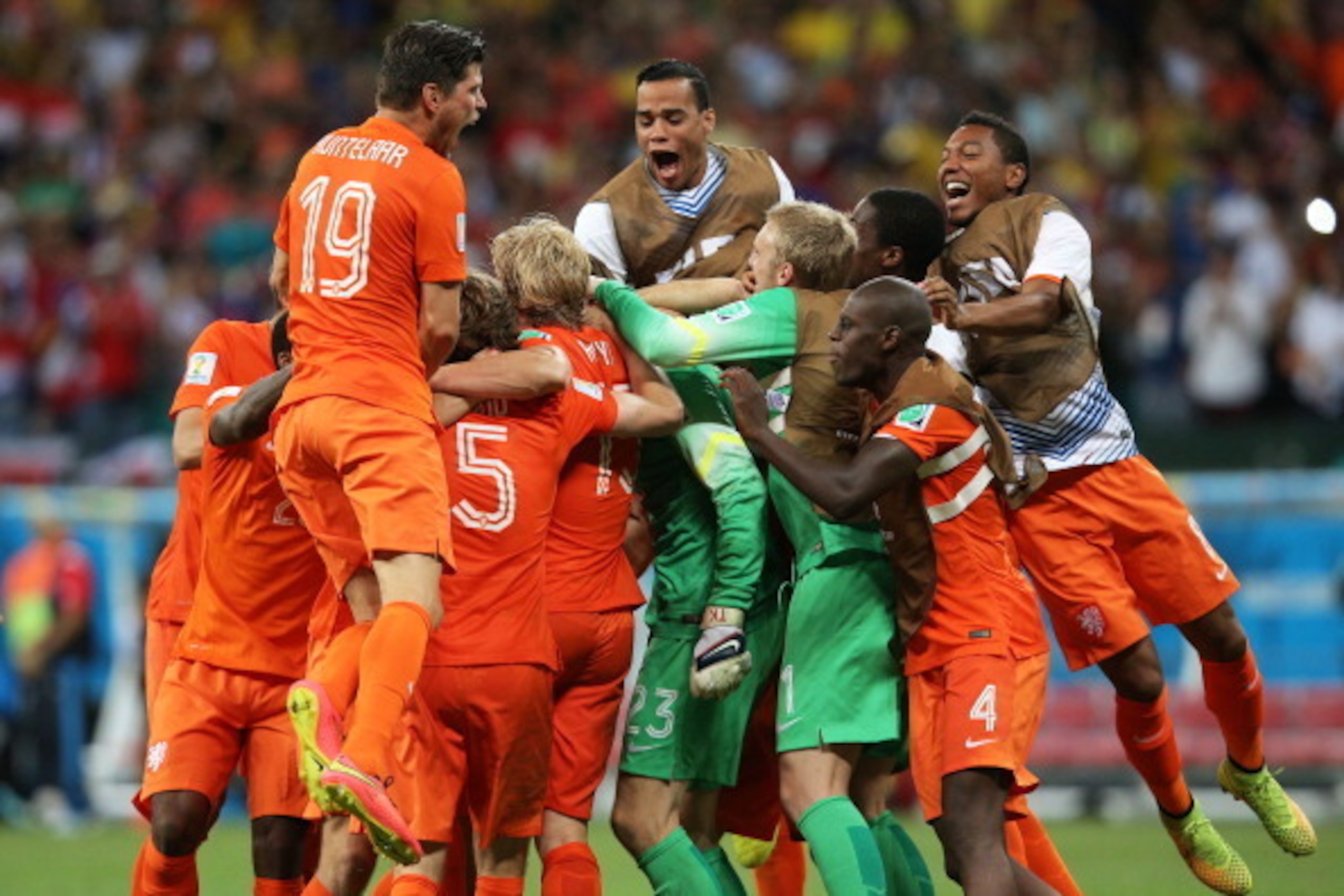 SALVADOR, BRAZIL - JULY 05:  Goalkeeper Tim Krul of the Netherlands celebrates with teammates after making a save in a penalty shootout to defeat Costa Rica during the 2014 FIFA World Cup Brazil Quarter Final match between the Netherlands and Costa Rica a
