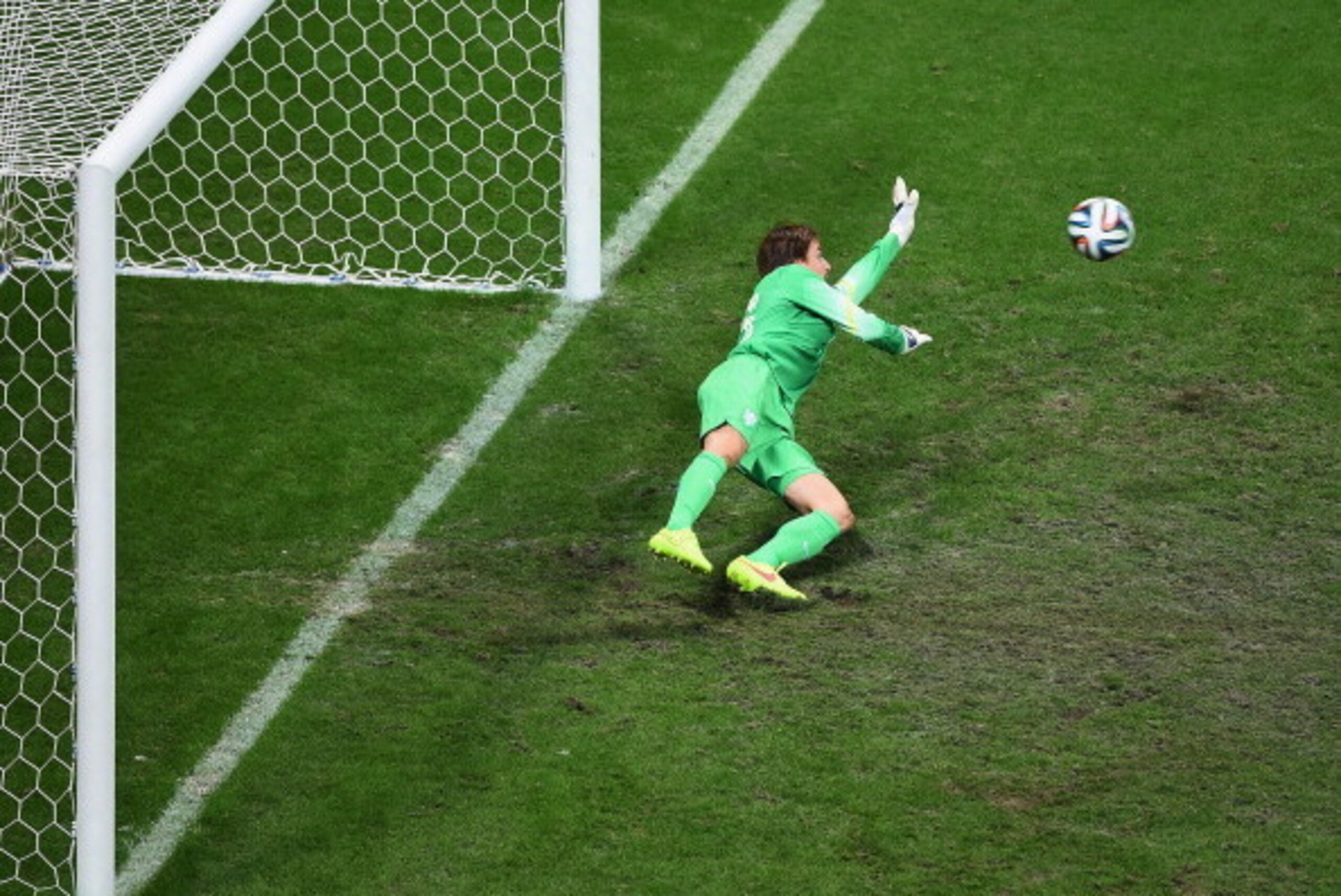 SALVADOR, BRAZIL - JULY 05:  Goalkeeper Tim Krul of the Netherlands saves a penalty from Michael Umana of Costa Rica in the shoot out during the 2014 FIFA World Cup Brazil Quarter Final match between the Netherlands and Costa Rica at Arena Fonte Nova on J