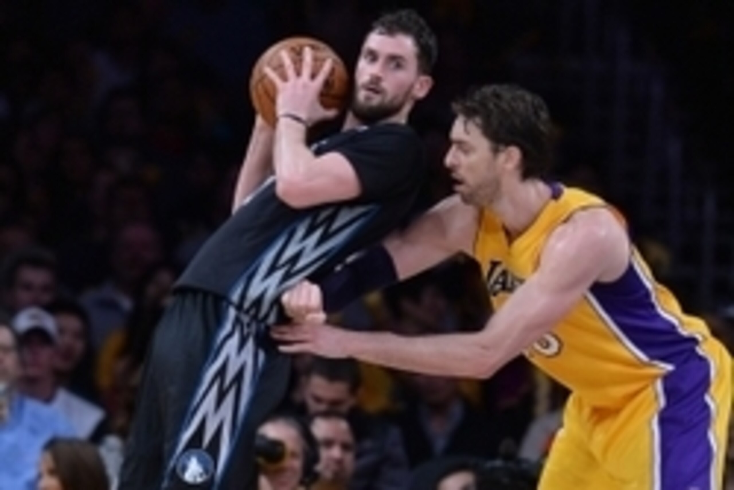 Dec 20, 2013; Los Angeles, CA, USA; Los Angeles Lakers center Pau Gasol (16) guards Minnesota Timberwolves power forward Kevin Love (42) in the second half of the game at Staples Center. The Lakers won 104-91. Mandatory Credit: Jayne Kamin-Oncea-USA TODAY