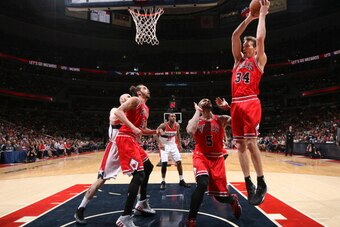 WASHINGTON, DC - APRIL 27:  Mike Dunleavy #34 of the Chicago Bulls grabs a rebound against the Washington Wizards in Game Four of the Eastern Conference Quarterfinals during the 2014 NBA Playoffs at the Verizon Center on April 27, 2014 in Washington, DC. 