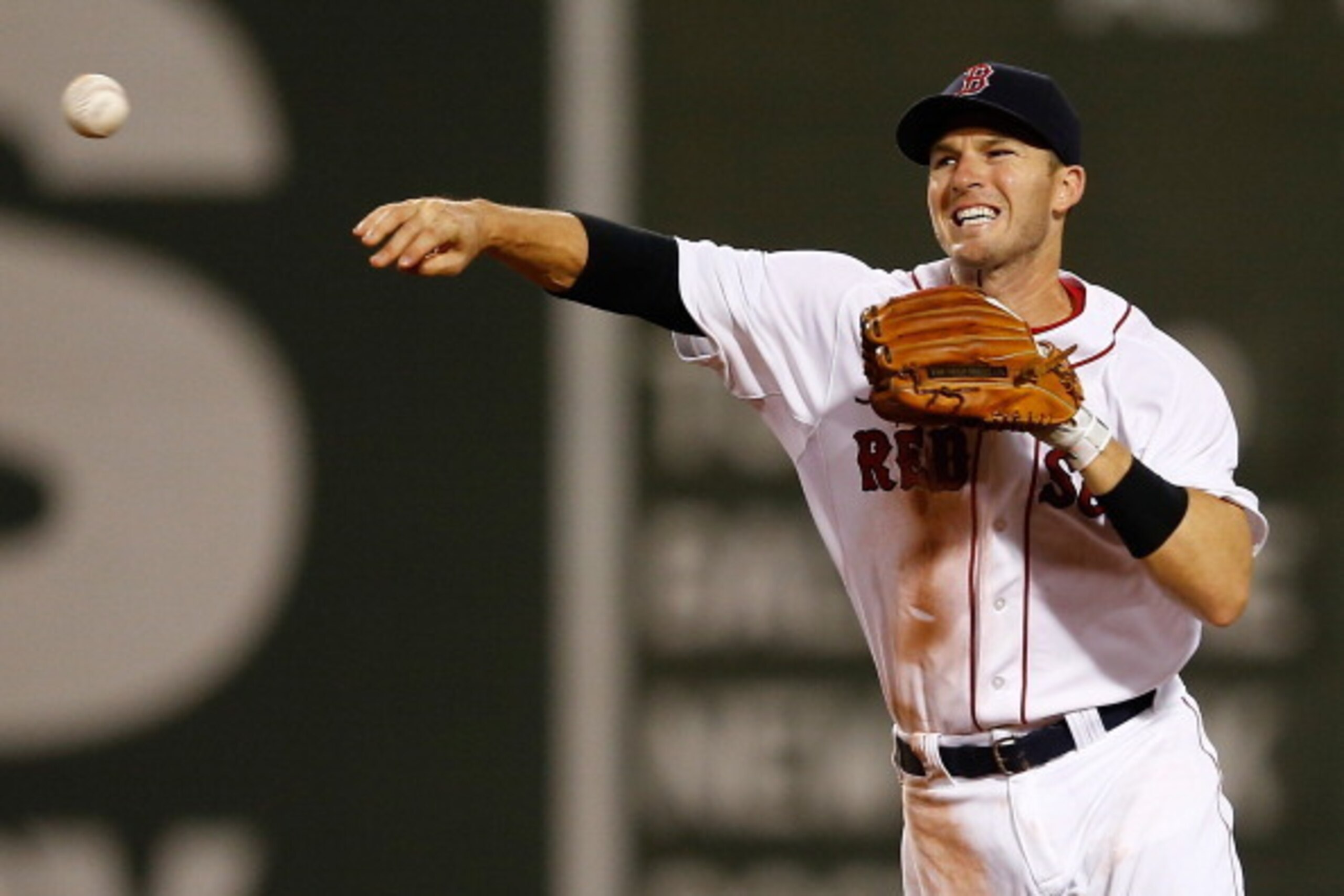 BOSTON, MA - JULY 1: Stephen Drew #7 of the Boston Red Sox makes the out on Justin Ruggiano #20 of the Chicago Cubs at second base but a run scored on the play in the sixth  inning on a fielder's choice at Fenway Park on July 1, 2014 in Boston, Massachuse