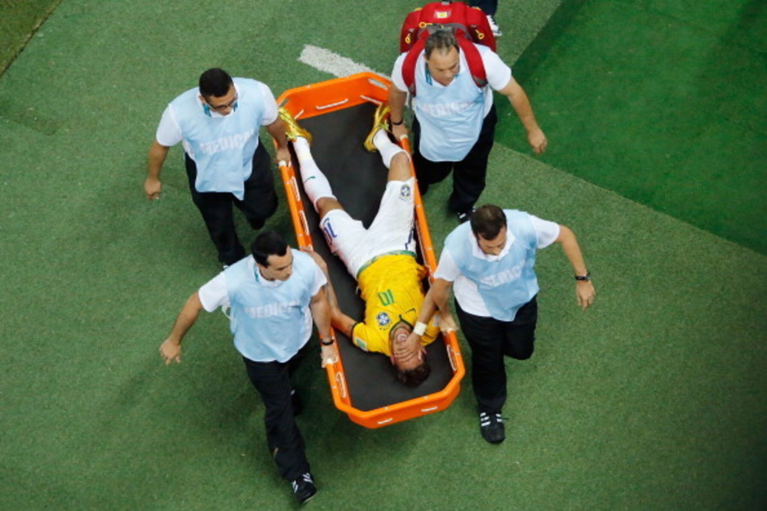 FORTALEZA, BRAZIL - JULY 04:  Neymar of Brazil is stretchered off the pitch after a challenge during the 2014 FIFA World Cup Brazil Quarter Final match between Brazil and Colombia at Castelao on July 4, 2014 in Fortaleza, Brazil.  (Photo by Pool/Getty Ima