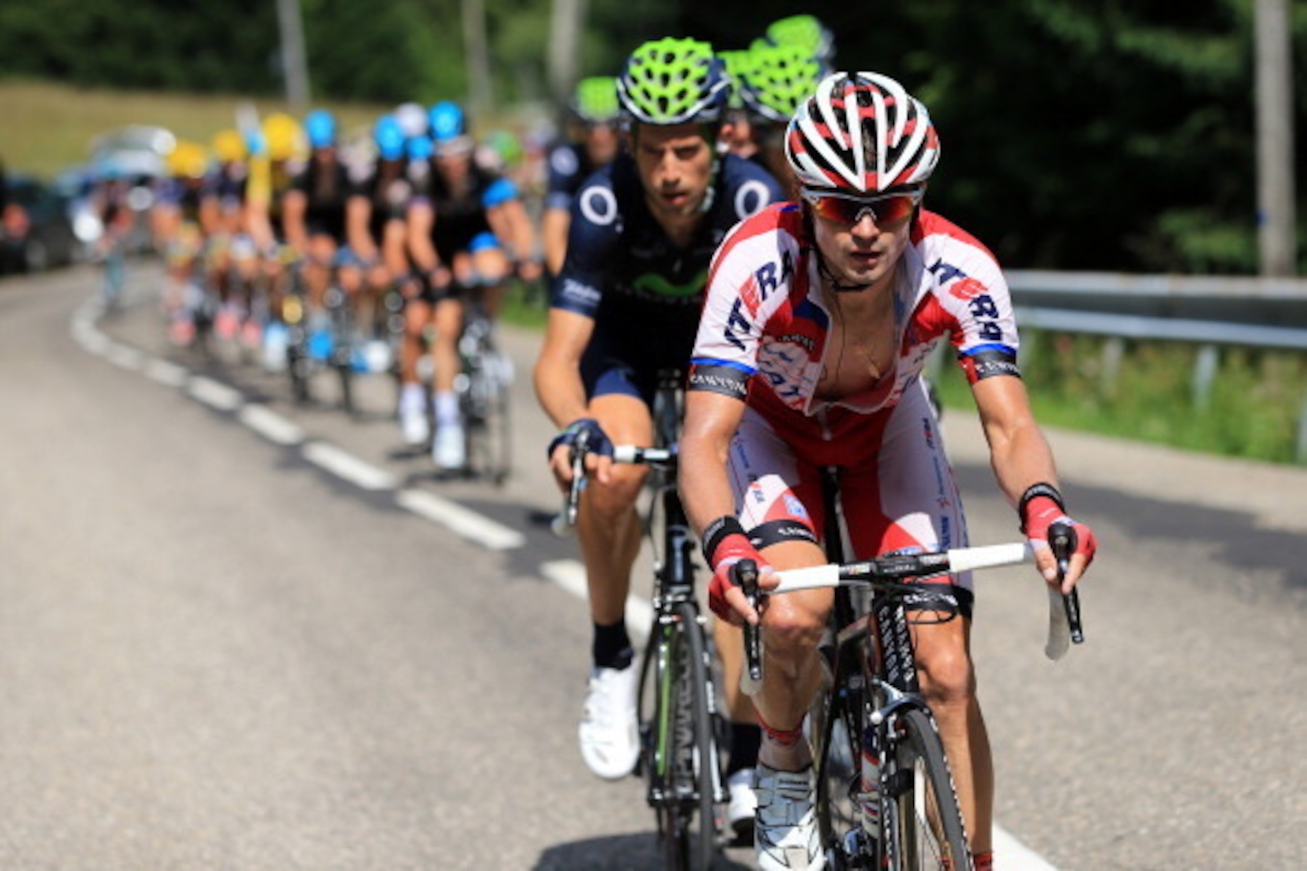 ANNECY, FRANCE - JULY 20: Eduard Vorganov leads the bunch during stage twenty of the 2013 Tour de France, a 125KM road stage from Annecy to Annecy-Semnoz, on July 20, 2013 in Annecy, France.  (Photo by Doug Pensinger/Getty Images)