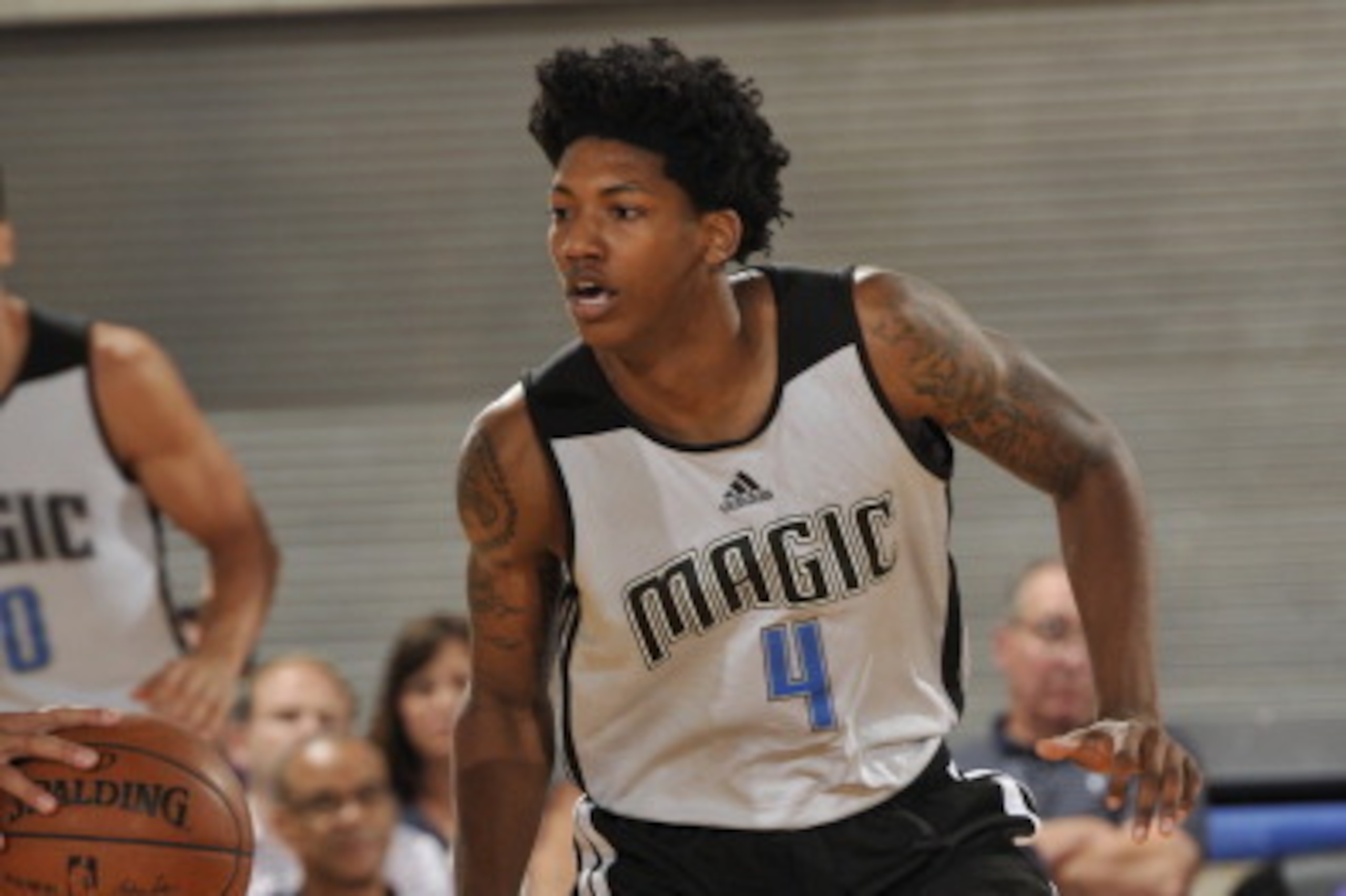 ORLANDO, FL - JULY 7: Elfrid Payton #4 of the Orlando Magic defends against the Houston Rockets on July 7, 2014 at Amway Center in Orlando, Florida. NOTE TO USER: User expressly acknowledges and agrees that, by downloading and or using this photograph, Us