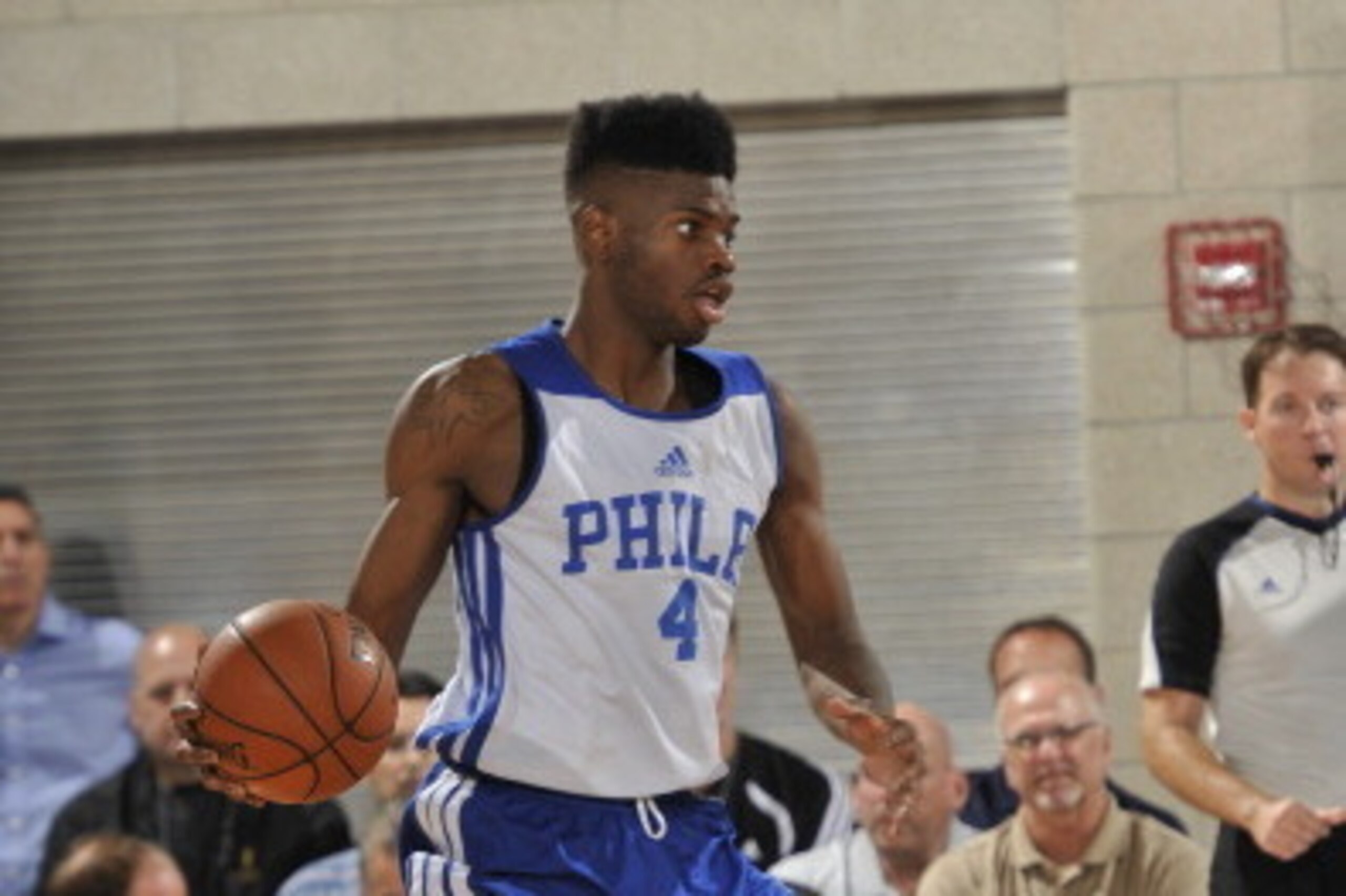 ORLANDO, FL - JULY 5: Nerlens Noel #4 of the Philadelphia 76ers handles the ball against the Orlando Magic on July 5, 2014 at Amway Center in Orlando, Florida. NOTE TO USER: User expressly acknowledges and agrees that, by downloading and or using this pho ORLANDO, FL - JULY 5: Nerlens Noel #4 of the Philadelphia 76ers handles the ball against the Orlando Magic on July 5, 2014 at Amway Center in Orlando, Florida. NOTE TO USER: User expressly acknowledges and agrees that, by downloading and or using this pho