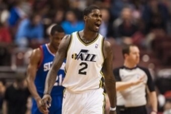 Mar 8, 2014; Philadelphia, PA, USA; Utah Jazz forward Marvin Williams (2) celebrates during the third quarter against the Philadelphia 76ers at Wells Fargo Center. The Jazz defeated the Sixers 104-92. Mandatory Credit: Howard Smith-USA TODAY Sports