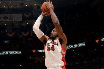 TORONTO, ON - MAY 4: Patrick Patterson #54 of the Toronto Raptors shoots against the Brooklyn Nets in Game Seven of the Eastern Conference Quarterfinals during the NBA Playoffs at the Air Canada Centre on May 4, 2014 in Toronto, Ontario, Canada. NOTE TO U
