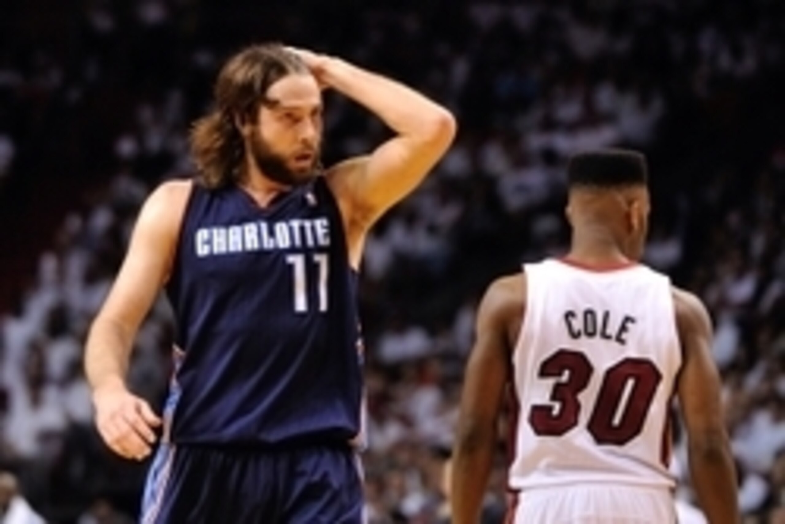 Apr 23, 2014; Miami, FL, USA; Charlotte Bobcats forward Josh McRoberts (11) reacts against the Miami Heat guard Norris Cole (30) in game two during the first round of the 2014 NBA Playoffs at American Airlines Arena. Mandatory Credit: Steve Mitchell-USA T Apr 23, 2014; Miami, FL, USA; Charlotte Bobcats forward Josh McRoberts (11) reacts against the Miami Heat guard Norris Cole (30) in game two during the first round of the 2014 NBA Playoffs at American Airlines Arena. Mandatory Credit: Steve Mitchell-USA T