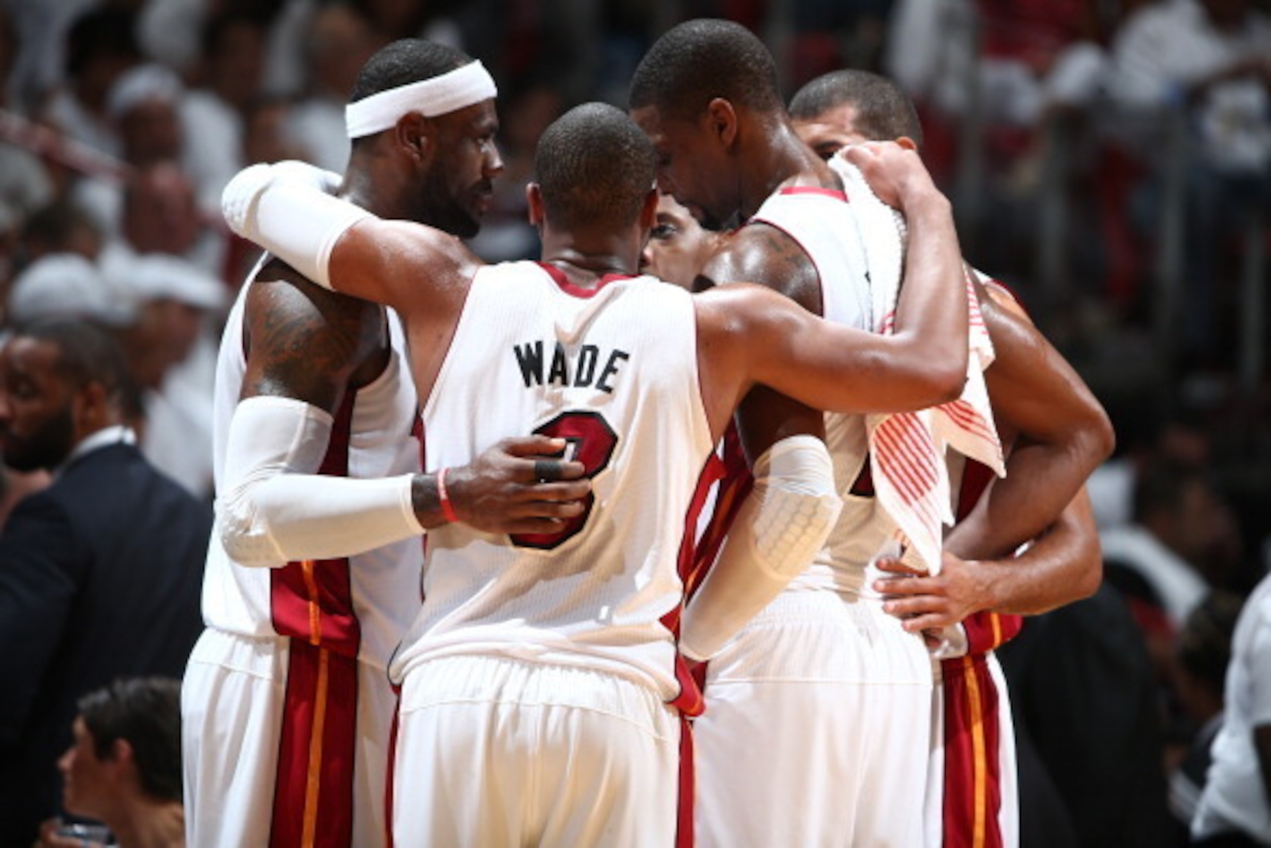 MIAMI, FL - MAY 8: LeBron James #6, Dwyane Wade #3, Chris Bosh #1 and teammates huddle during Game Two of the Eastern Conference Semifinals against the Brooklyn Nets in the 2014 NBA playoffs at American Airlines Arena in Miami, Florida on May 8, 2014.  NO