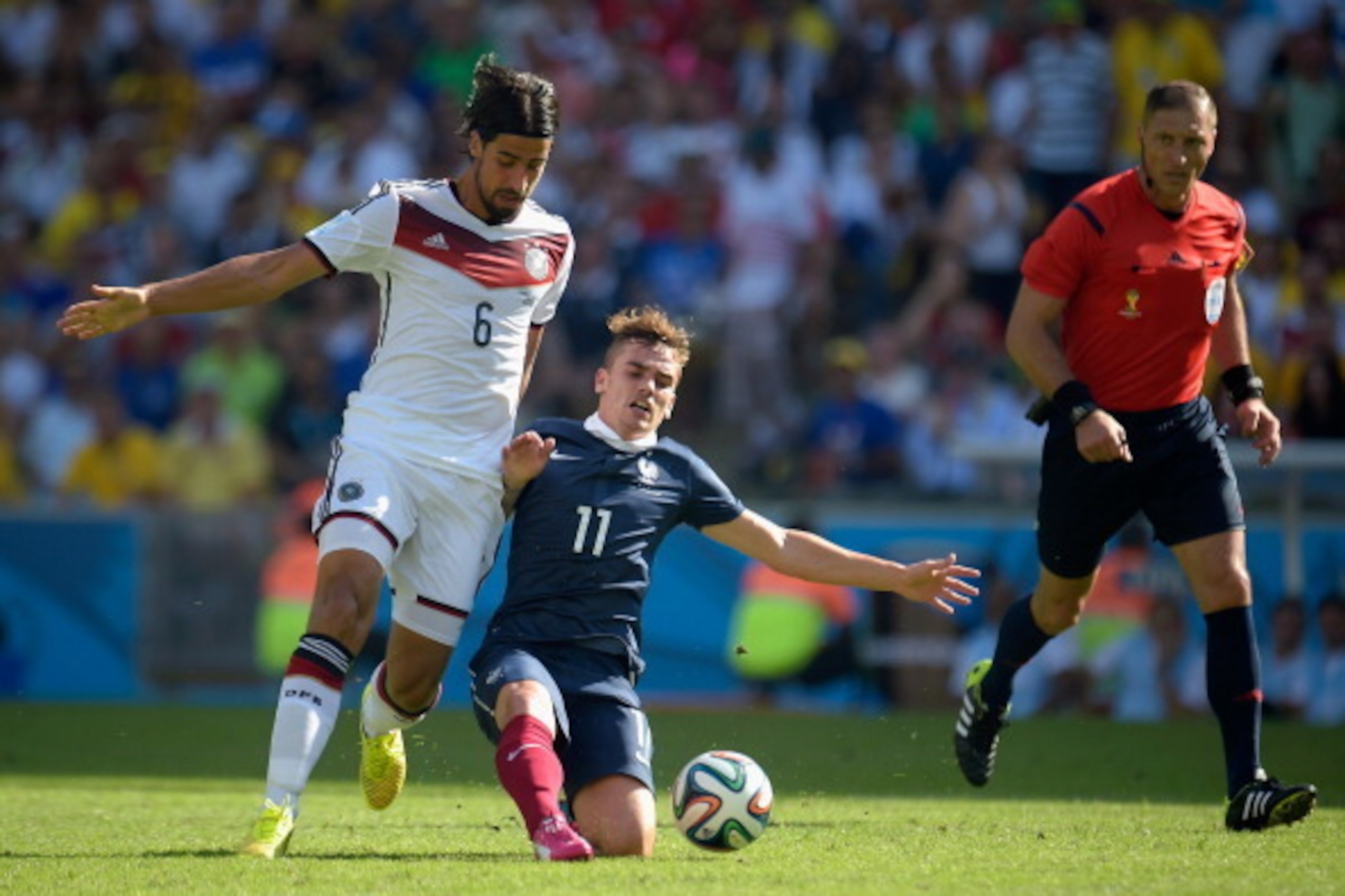 RIO DE JANEIRO, BRAZIL - JULY 04: Sami Khedira of Germany and Antoine Griezmann of France compete for the ball during the 2014 FIFA World Cup Brazil Quarter Final match between France and Germany at Maracana on July 4, 2014 in Rio de Janeiro, Brazil. (P RIO DE JANEIRO, BRAZIL - JULY 04: Sami Khedira of Germany and Antoine Griezmann of France compete for the ball during the 2014 FIFA World Cup Brazil Quarter Final match between France and Germany at Maracana on July 4, 2014 in Rio de Janeiro, Brazil. (P