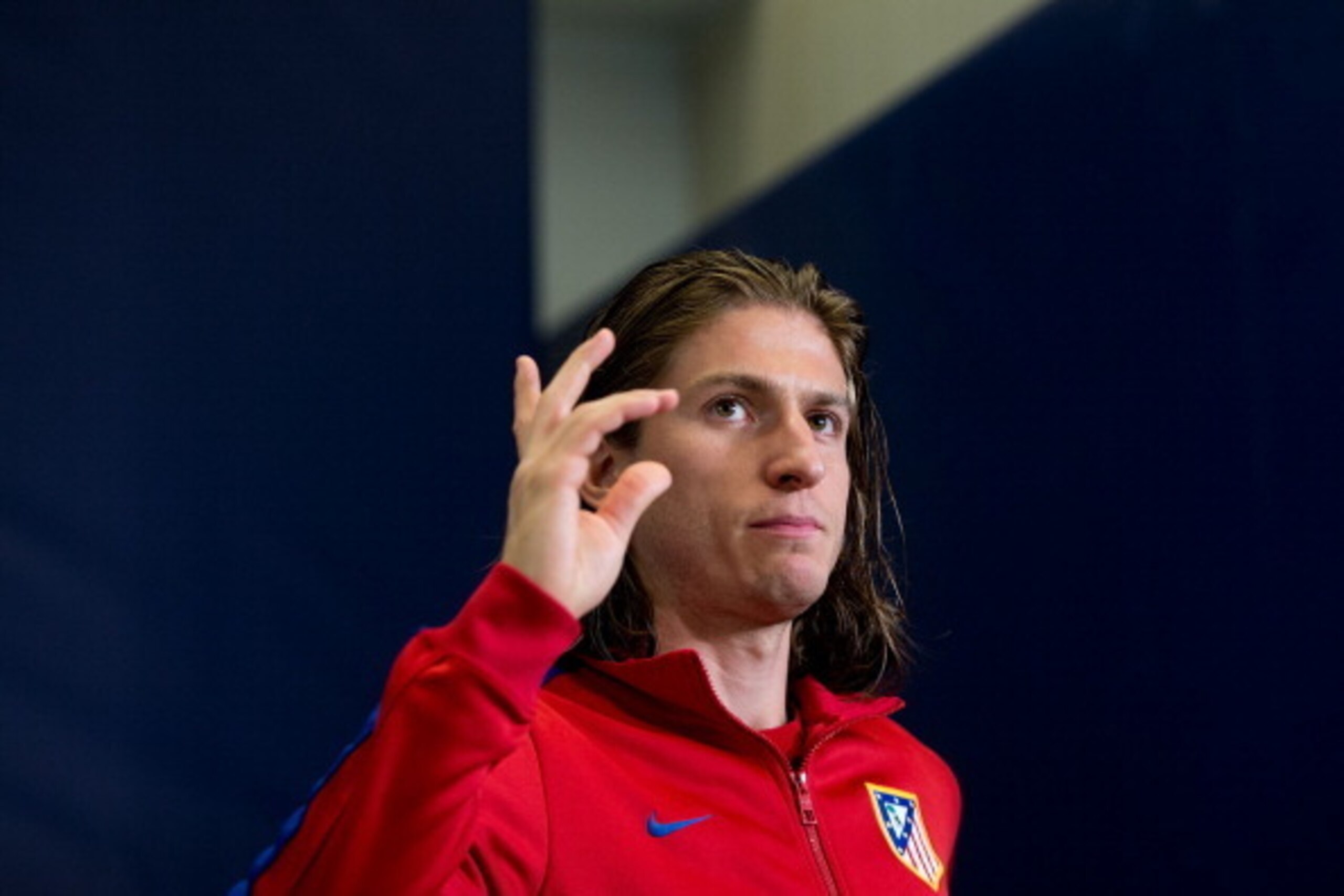 MADRID, SPAIN - MAY 19:  Player Filipe Luis of Atletico de Madrid say goodbye leaving Club Atletico de Madrid press conference during the Media Day prior to UEFA Champions League Final between Club Atletico de Madrid and Real Madrid CF at Vicente Calderon