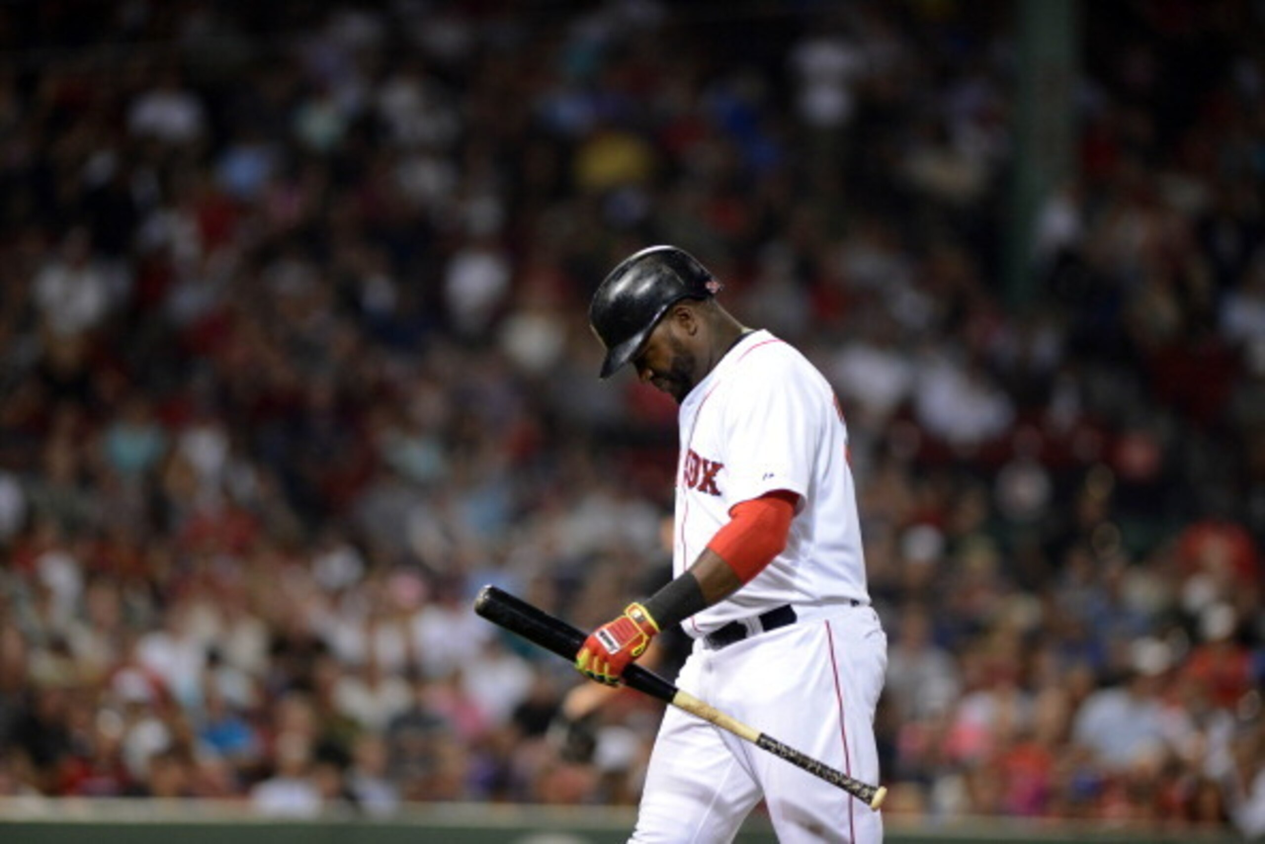 BOSTON, MA - JULY 7: David Ortiz #34 of the Boston Red Sox walks back to the dugout after making an out in the seventh inning against the Chicago White Sox at Fenway Park on July 7, 2014 in Boston, Massachusetts. (Photo by Darren McCollester/Getty Images)