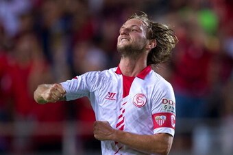 SEVILLE, SPAIN - SEPTEMBER 25:   Ivan Rakitic of Sevilla FC celebrates after scoring Sevilla's second goal during the La liga match between Sevilla FC and Rayo Vallecano de Madrid at Estadio Ramon Sanchez Pizjuan on September 25, 2013 in Seville, Spain.  