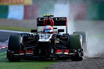 SUZUKA, JAPAN - OCTOBER 11:  Romain Grosjean of France and Lotus runs wide during practice for the Japanese Formula One Grand Prix at Suzuka Circuit on October 11, 2013 in Suzuka, Japan.  (Photo by Clive Mason/Getty Images,)