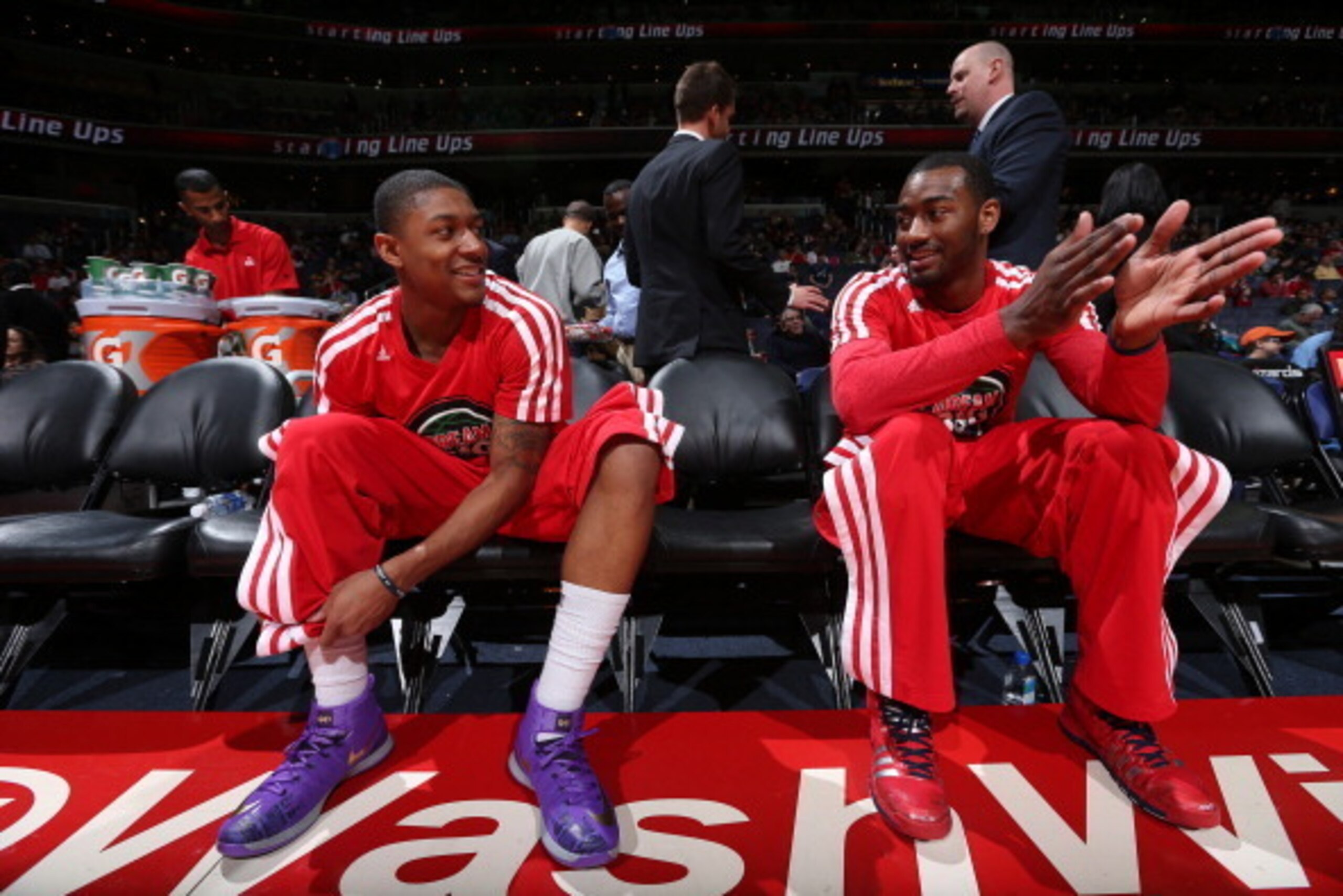 WASHINGTON, DC - JANUARY 20: Bradley Beal #3 and John Wall #2 of the Washington Wizards wait for pre-game announcements against the Philadelphia 76ers during the game at the Verizon Center on January 20, 2014 in Washington, DC. NOTE TO USER: User expressl