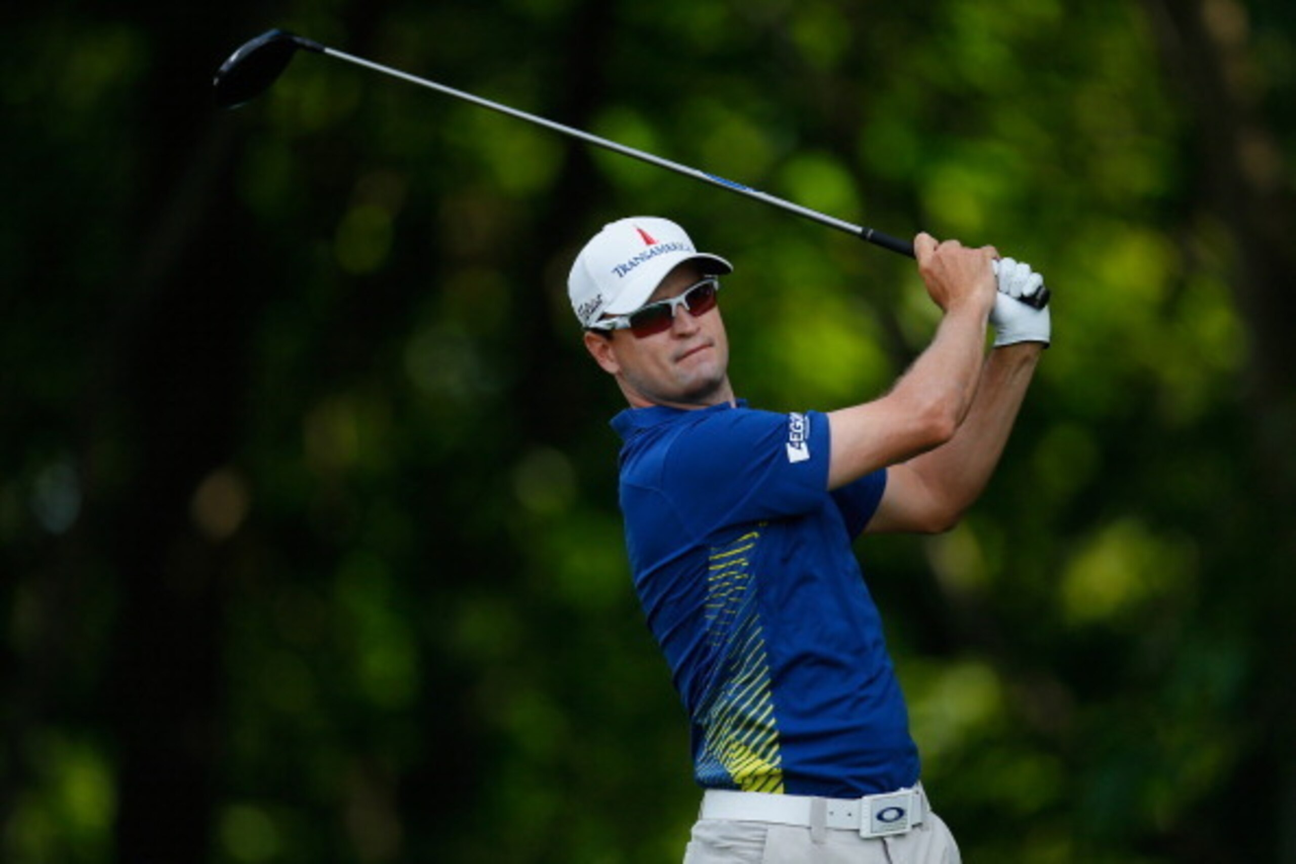 CROMWELL, CT - JUNE 20: Zach Johnson of the United States hits his tee shot onthe 12th hole during the second round of the Travelers Championship golf tournament at the TPC River Highlands on June 20, 2014 in Cromwell, Connecticut.  (Photo by Jeff Haynes/