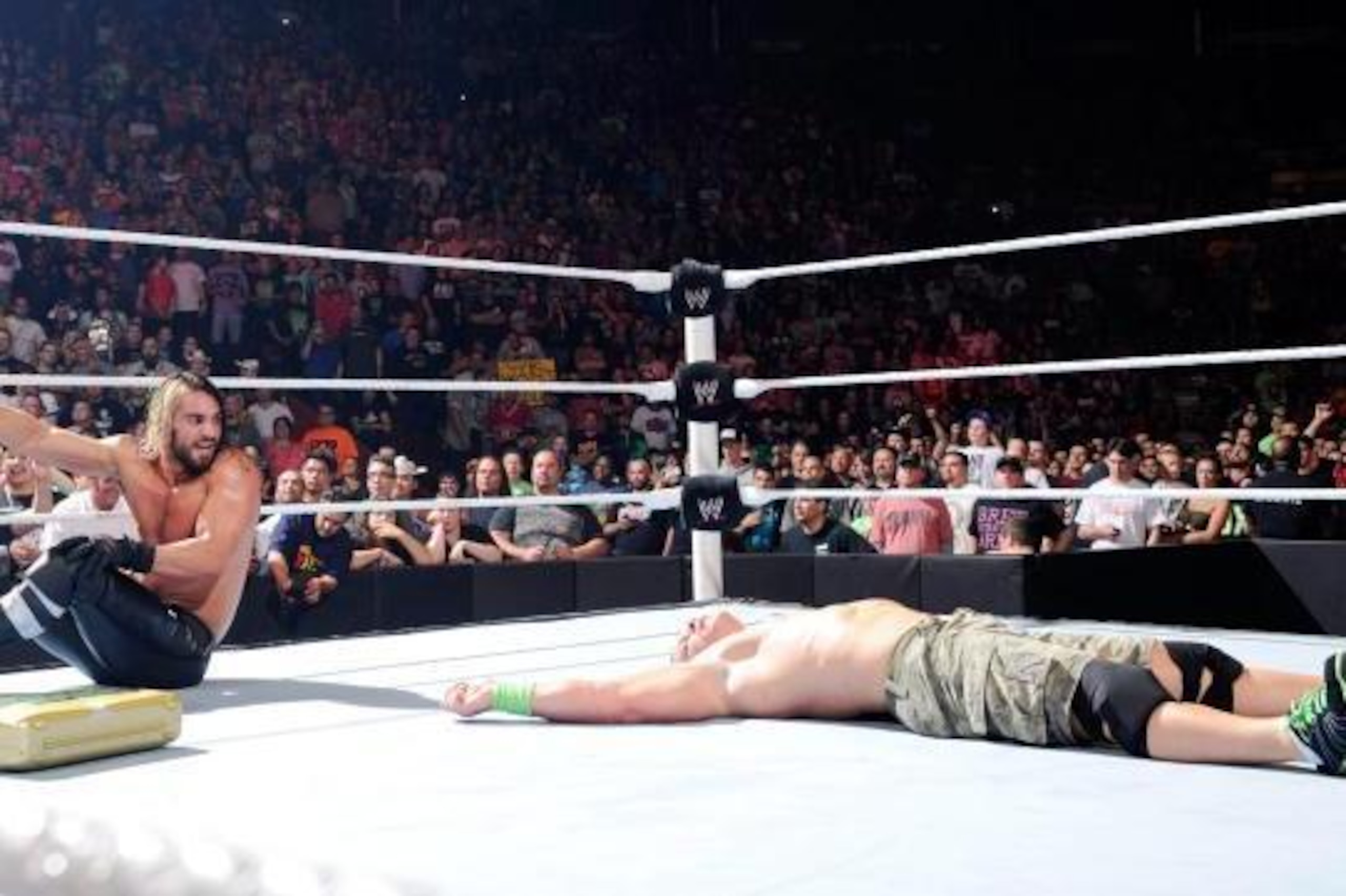 Rollins thinks about cashing in on a fallen Cena.