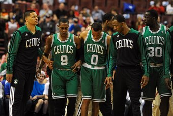Apr 14, 2014; Philadelphia, PA, USA; Boston Celtics guard Rajon Rondo (9) walks off the court after being injured in the first quarter of the game against the Philadelphia 76ers  at Wells Fargo Center. Mandatory Credit: John Geliebter-USA TODAY Sports