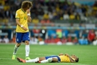 July 8, 2014; Belo Horizonte, BRAZIL; Brazil players David Luiz (4) and Luiz Gustavo (right) react after the semifinal match against Germany in the 2014 World Cup at Mineirao Stadium.  Mandatory Credit: Tim Groothuis/Witters Sport via USA TODAY Sports