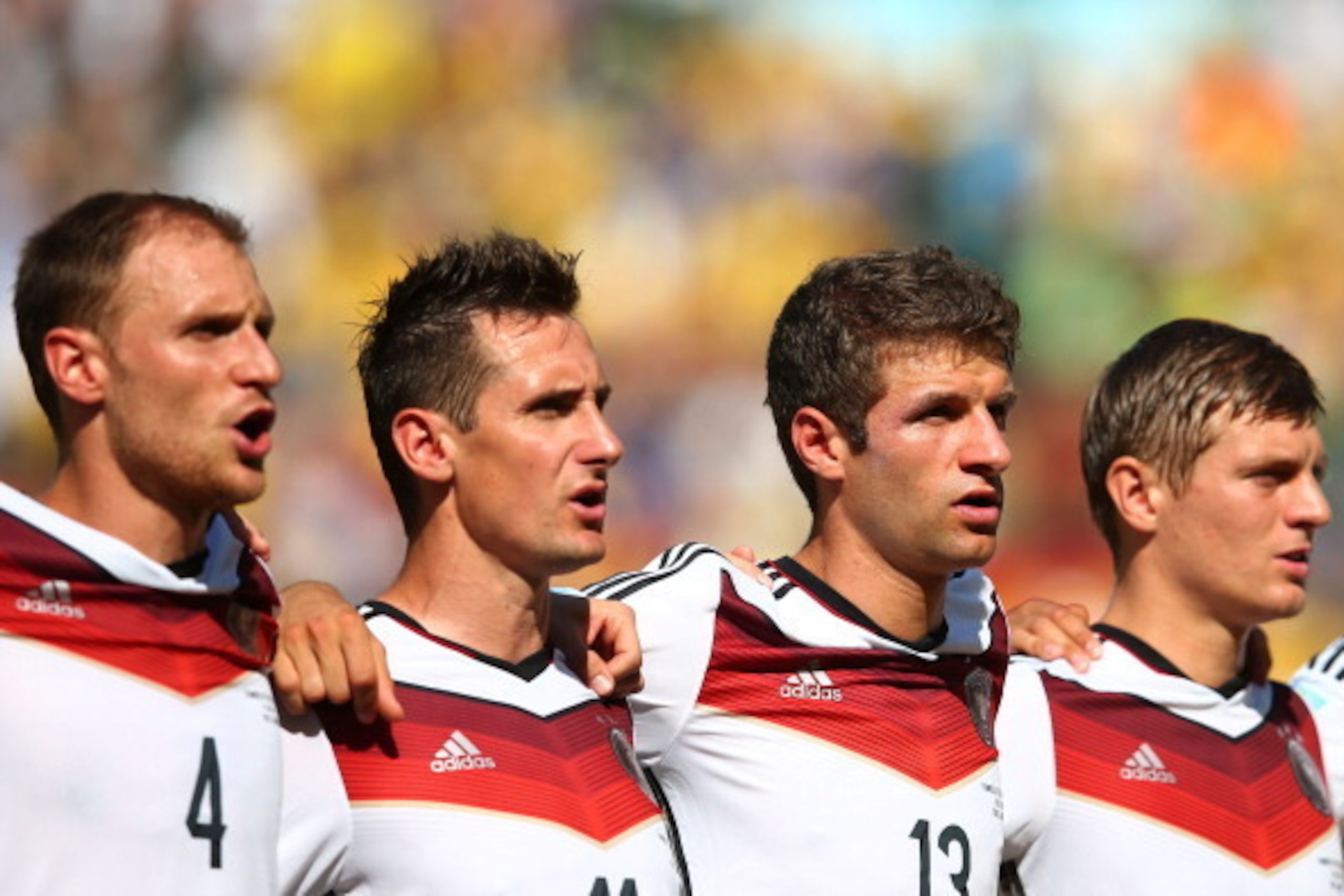 RIO DE JANEIRO, BRAZIL - JULY 04:  (L-
R) Benedikt Hoewedes, Miroslav Klose, Thomas Mueller and Toni Kroos of Germany sing the National Anthem prior to the 2014 FIFA World Cup Brazil Quarter Final match between France and Germany at Maracana on July 4, 20