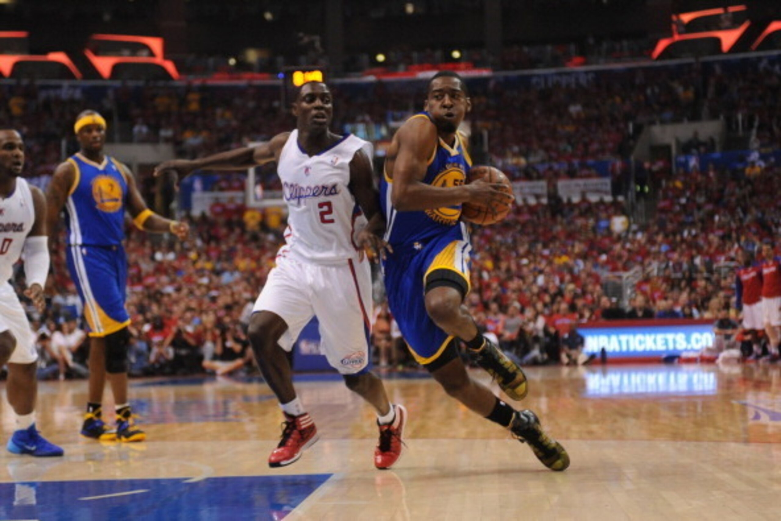 LOS ANGELES, CA - MAY 3: Jordan Crawford #55 of the Golden State Warriors drives to the basket against Darren Collison #2 of the Los Angeles Clippers in Game Seven of the Western Conference Quarterfinals during the 2014 NBA Playoffs at Staples Center on M