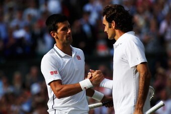 LONDON, ENGLAND - JULY 06:  Novak Djokovic of Serbia shakes hands with Roger Federer of Switzerland after their Gentlemen's Singles Final match on day thirteen of the Wimbledon Lawn Tennis Championships at the All England Lawn Tennis and Croquet Club on J