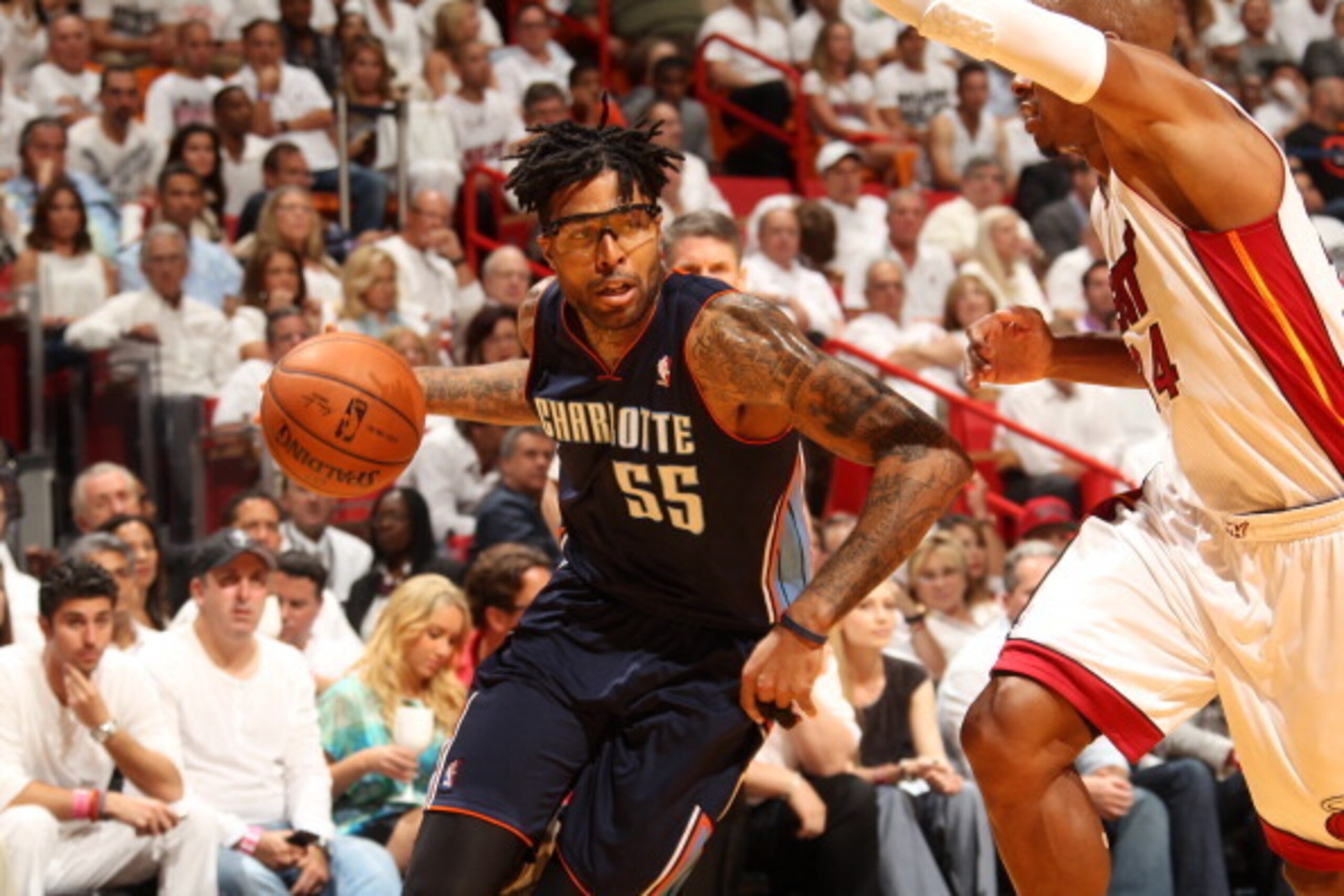 MIAMI, FL - April 23: Chris Douglas-Roberts #55 of the Charlotte Bobcats handles the ball against the Miami Heat during Game Two of the Eastern Conference Quarterfinals of the 2014 NBA playoffs at the American Airlines Arena in Miami, Florida on April 23,