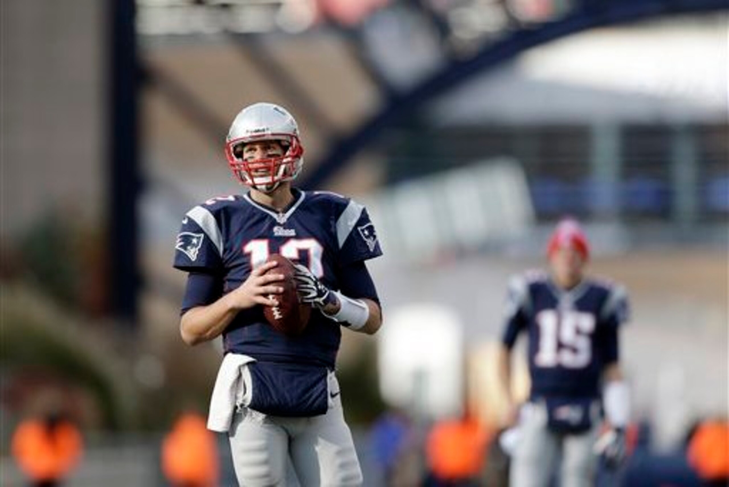 Tom Brady (12, left) is still in the picture, while Ryan Mallett (15, right) has faded further into the background.