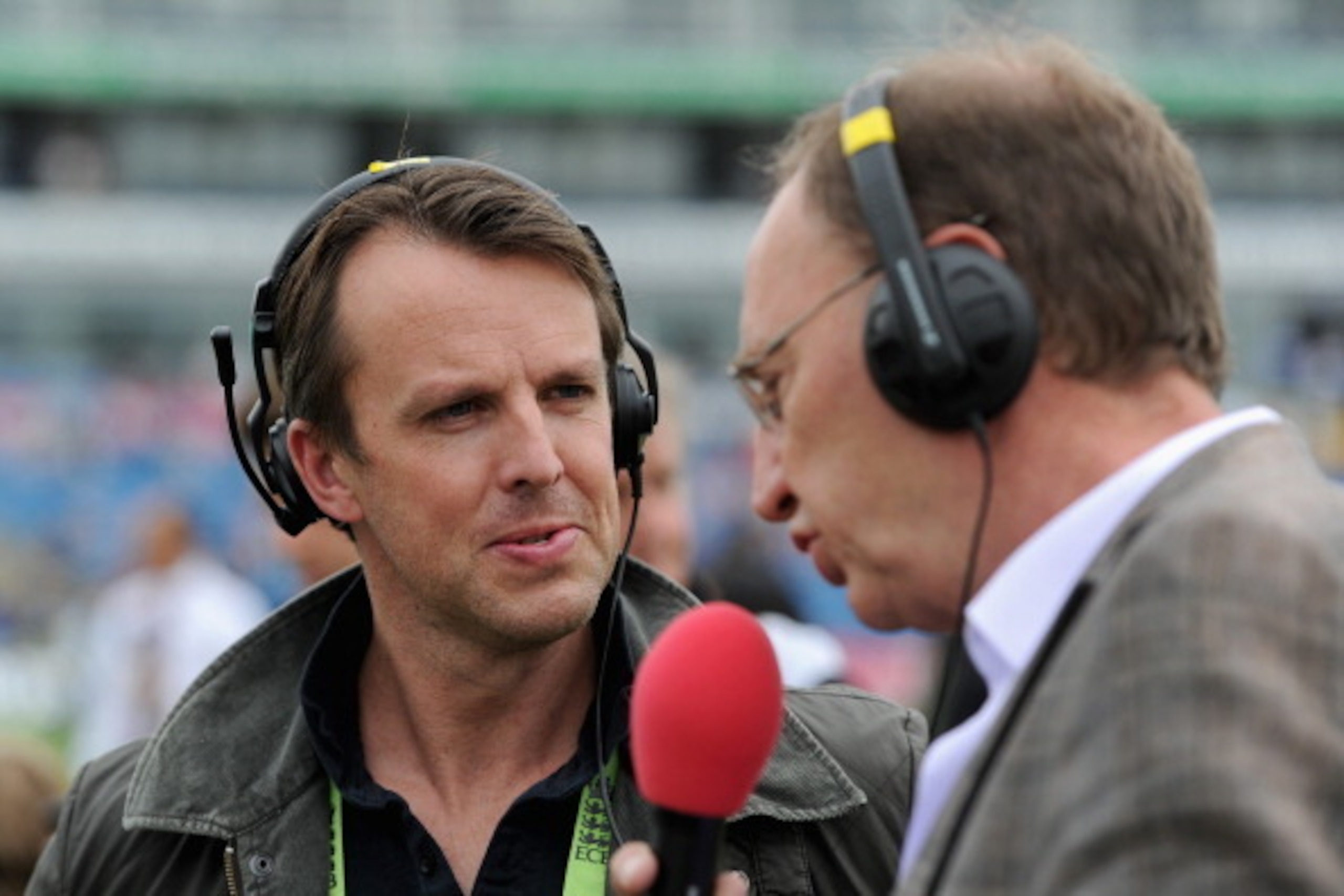LEEDS, ENGLAND - JUNE 20:  Former England cricketer Graeme Swann speaks with Test Match Special commentators Jonathan Agnew and Michael Vaughan ahead of day one of 2nd Investec Test match between England and Sri Lanka at Headingley Cricket Ground on June 