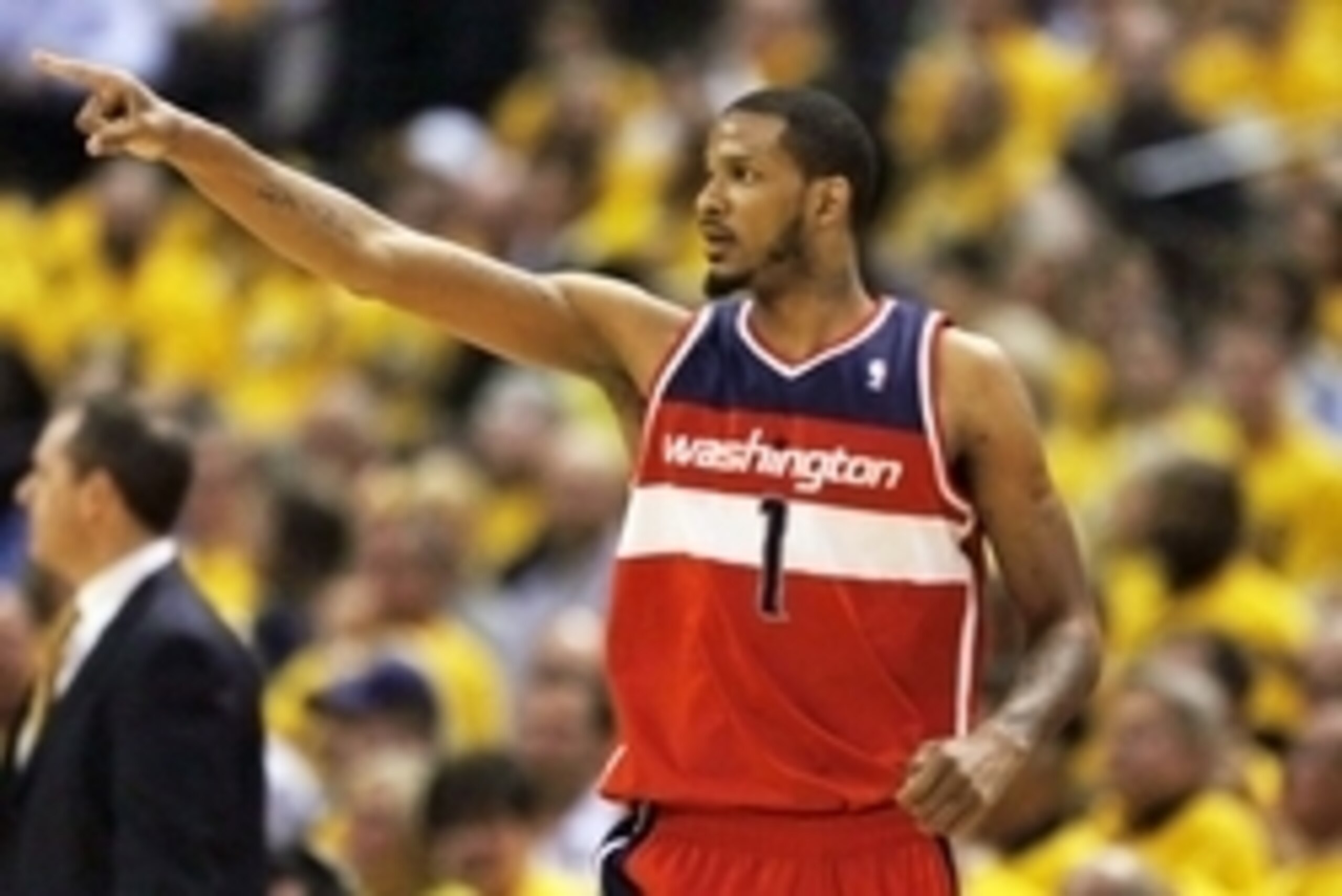 May 5, 2014; Indianapolis, IN, USA; Washington Wizards forward Trevor Ariza (1) points after scoring against the Indiana Pacers in game one of the second round of the 2014 NBA Playoffs at Bankers Life Fieldhouse. Washington defeats Indiana 102-96. Mandato