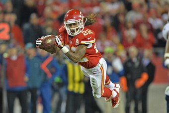 KANSAS CITY, MO - DECEMBER 01:  Wide receiver Dexter McCluster #22 of the Kansas City Chiefs makes a diving catch against the Denver Broncos during the second half on December 1, 2013 at Arrowhead Stadium in Kansas City, Missouri.  Denver beat Kansas City