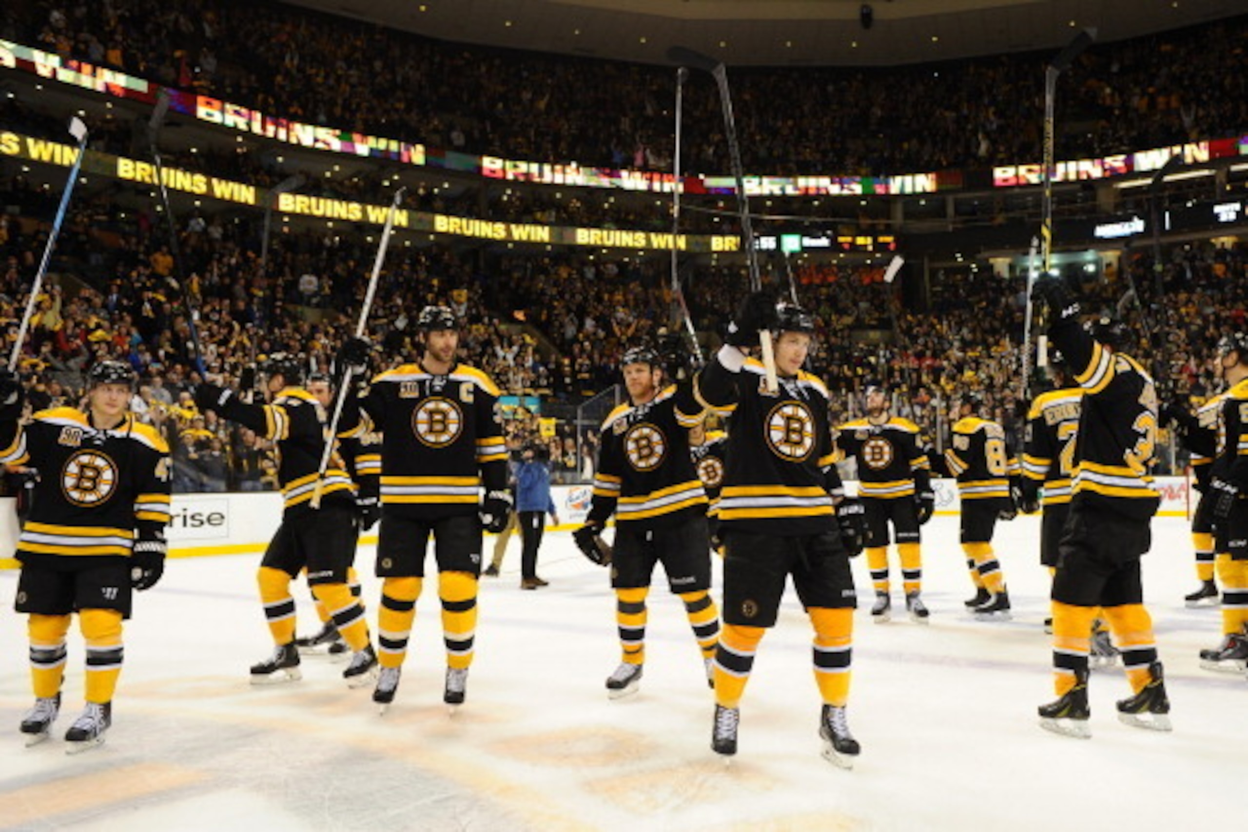 BOSTON, MA - APRIL 26: The Boston Bruins salute to the fans after winning the game against the Detroit Red Wings in Game Five of the First Round of the 2014 Stanley Cup Playoffs at TD Garden on April 26, 2014 in Boston, Massachusetts. (Photo by Brian Babi