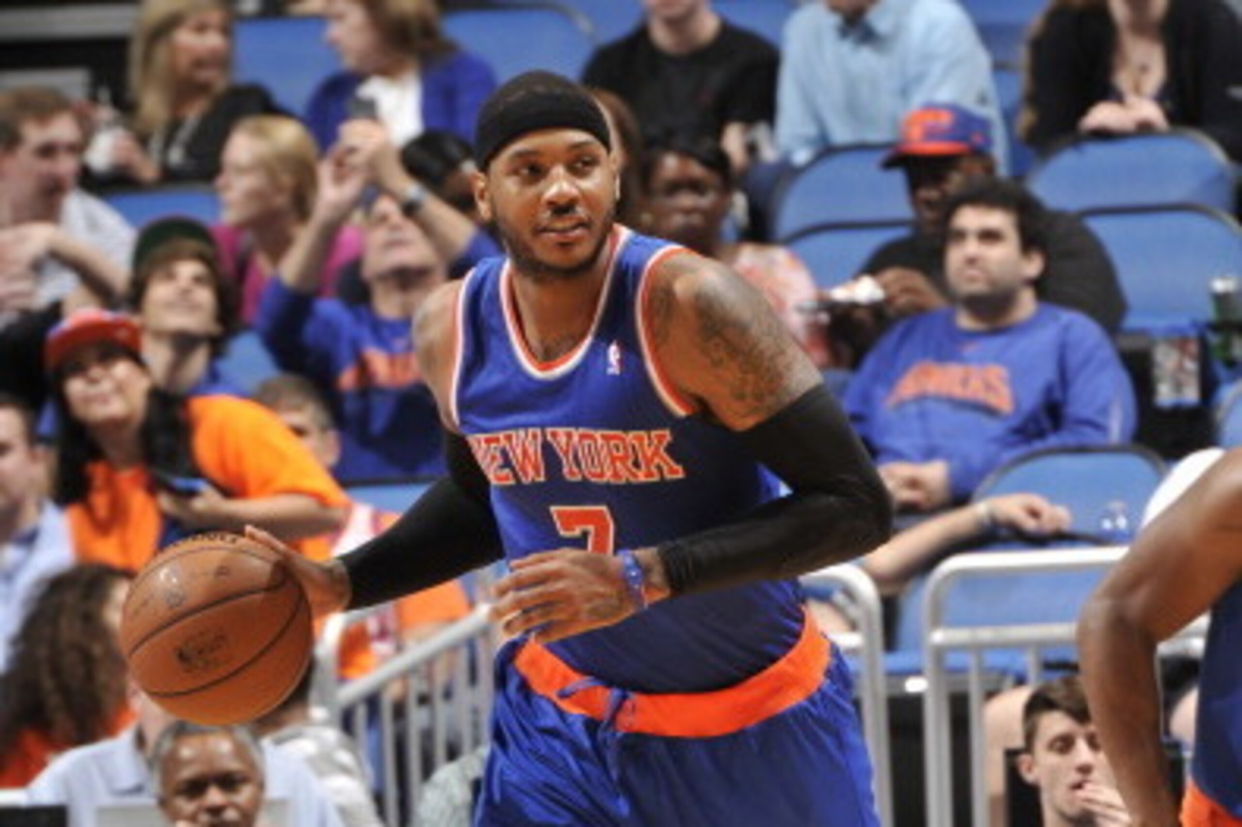 ORLANDO, FL - DECEMBER 23: Carmelo Anthony #7 of the New York Knicks dribbles up the court against the Orlando Magic during the game on December 23, 2013 at Amway Center in Orlando, Florida. NOTE TO USER: User expressly acknowledges and agrees that, by do