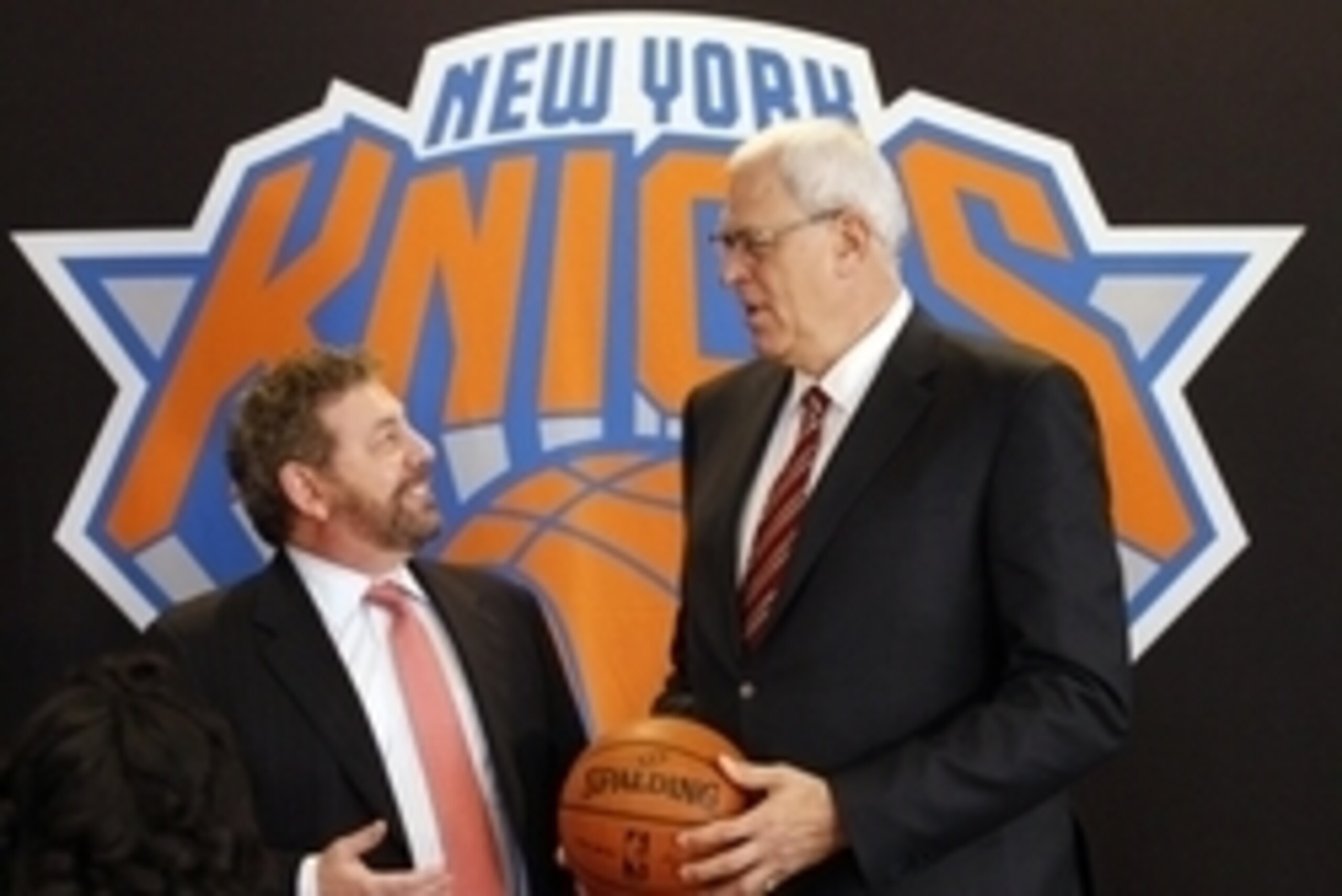 Mar 18, 2014; New York, NY, USA; New York Knicks new president of basketball operations Phil Jackson (right) talks with Madison Square Garden chairman James Dolan at a press conference at Madison Square Garden.  Mandatory Credit: William Perlman/THE STAR-