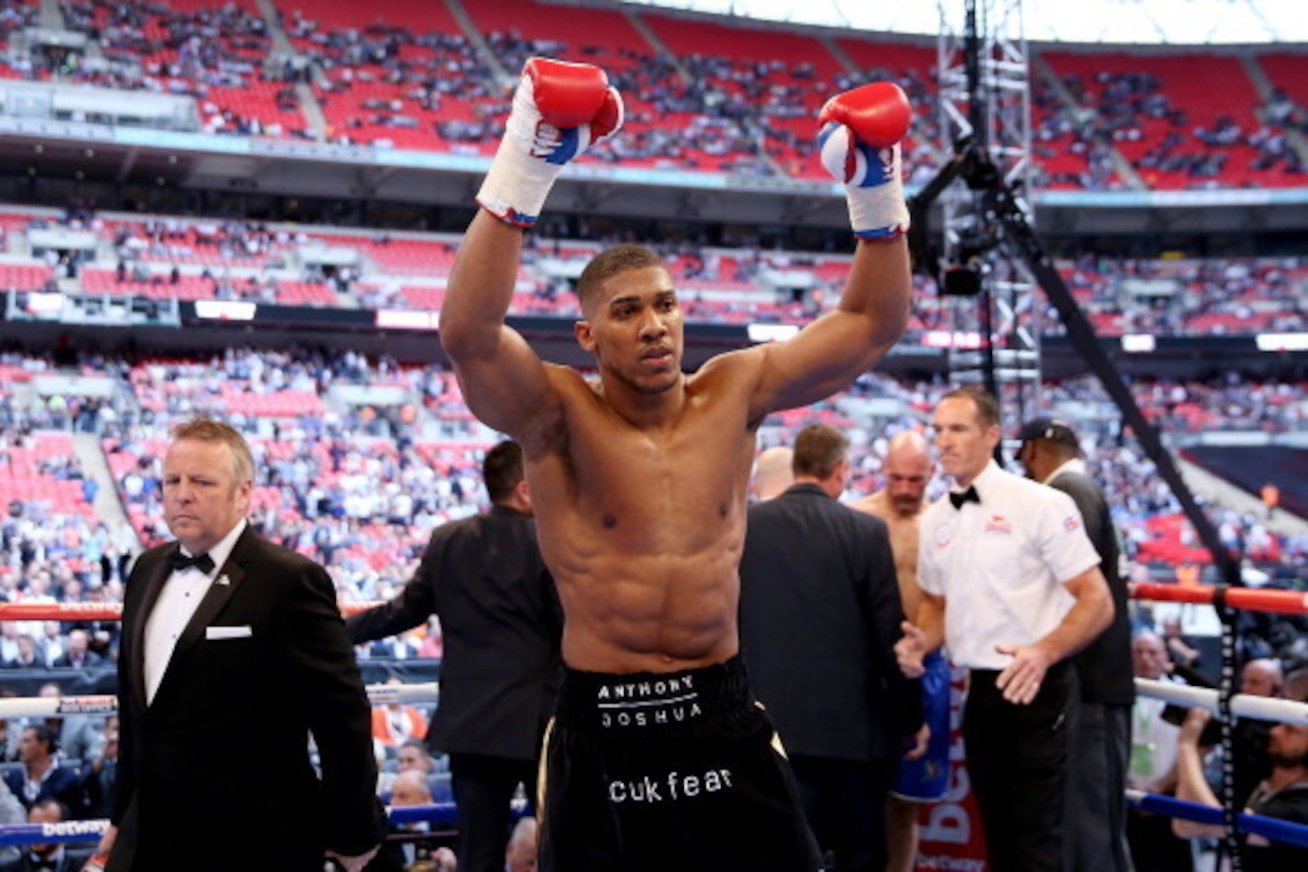 LONDON, ENGLAND - MAY 31:  Anthony Joshua celebrates his victory over Matt Legg during their Heavyweight bout at Wembley Stadium on May 31, 2014 in London, England.  (Photo by Scott Heavey/Getty Images)