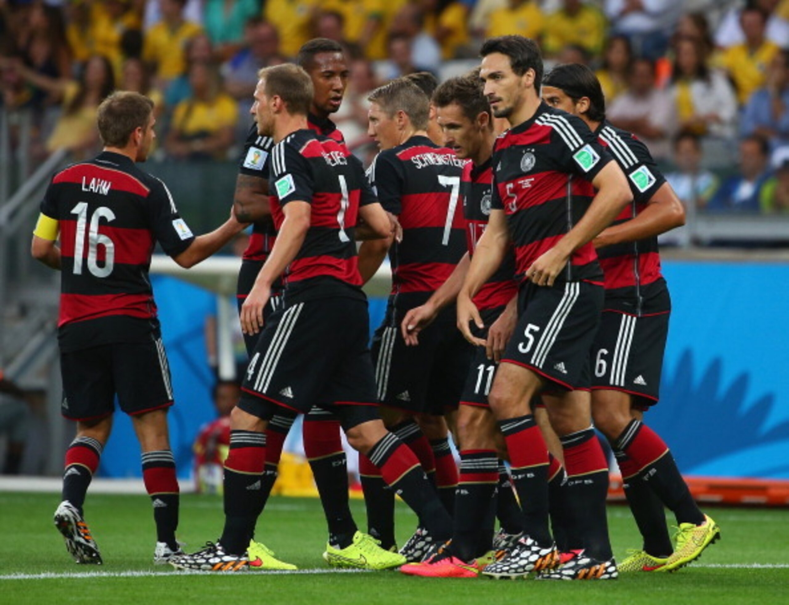 BELO HORIZONTE, BRAZIL - JULY 08:  Thomas Mueller (obscured) of Germany celebrates with his team-mates (L-R) Philipp Lahm, Benedikt Hoewedes, Jerome Boateng, Bastian Schweinsteiger, Miroslav Klose and Mats Hummels of Germany after scoring the opening goal