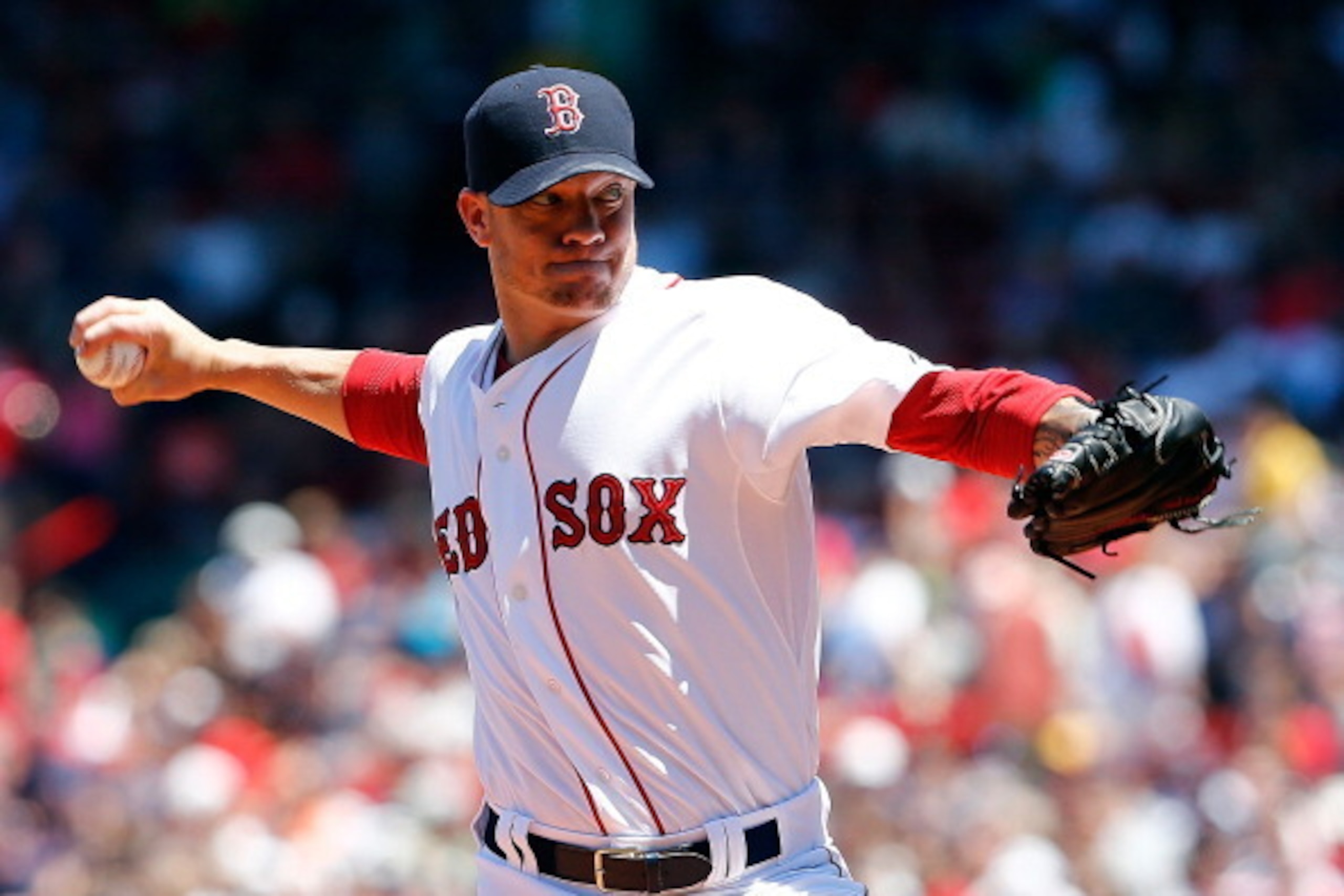 BOSTON, MA - JULY 6:  Jake Peavy #44 of the Boston Red Sox throws in the first inning against the Baltimore Orioles at Fenway Park on July 6, 2014 in Boston, Massachusetts.  (Photo by Jim Rogash/Getty Images)