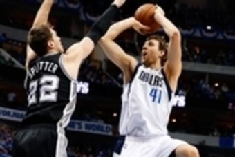 May 2, 2014; Dallas, TX, USA; Dallas Mavericks forward Dirk Nowitzki (41) shoots over San Antonio Spurs center Tiago Splitter (22) during the game in game six of the first round of the 2014 NBA Playoffs at American Airlines Center. Mandatory Credit: Kevin May 2, 2014; Dallas, TX, USA; Dallas Mavericks forward Dirk Nowitzki (41) shoots over San Antonio Spurs center Tiago Splitter (22) during the game in game six of the first round of the 2014 NBA Playoffs at American Airlines Center. Mandatory Credit: Kevin