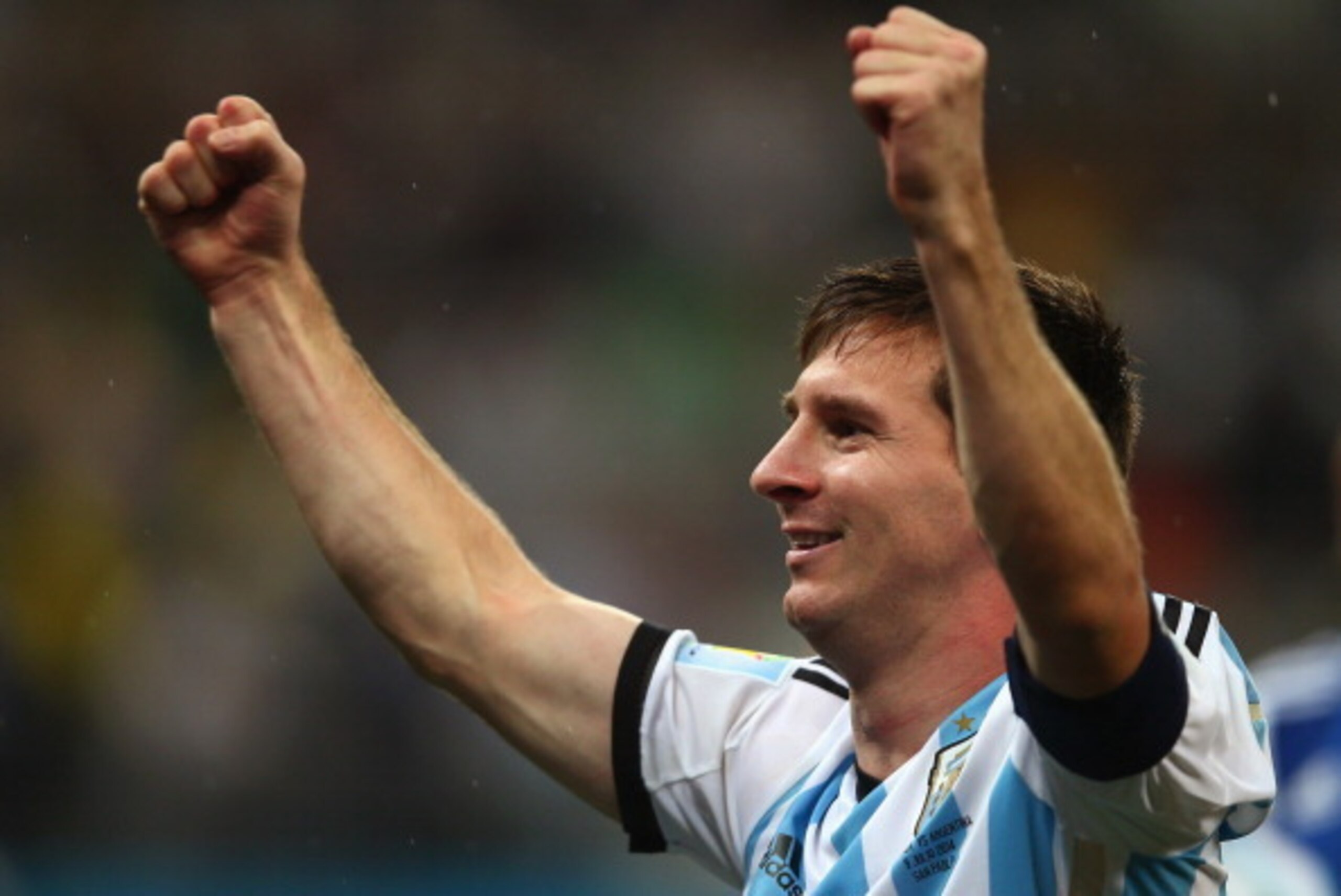 SAO PAULO, BRAZIL - JULY 09:  Lionel Messi of Argentina celebrates defeating the Netherlands in a shootout during the 2014 FIFA World Cup Brazil Semi Final match between the Netherlands and Argentina at Arena de Sao Paulo on July 9, 2014 in Sao Paulo, Bra