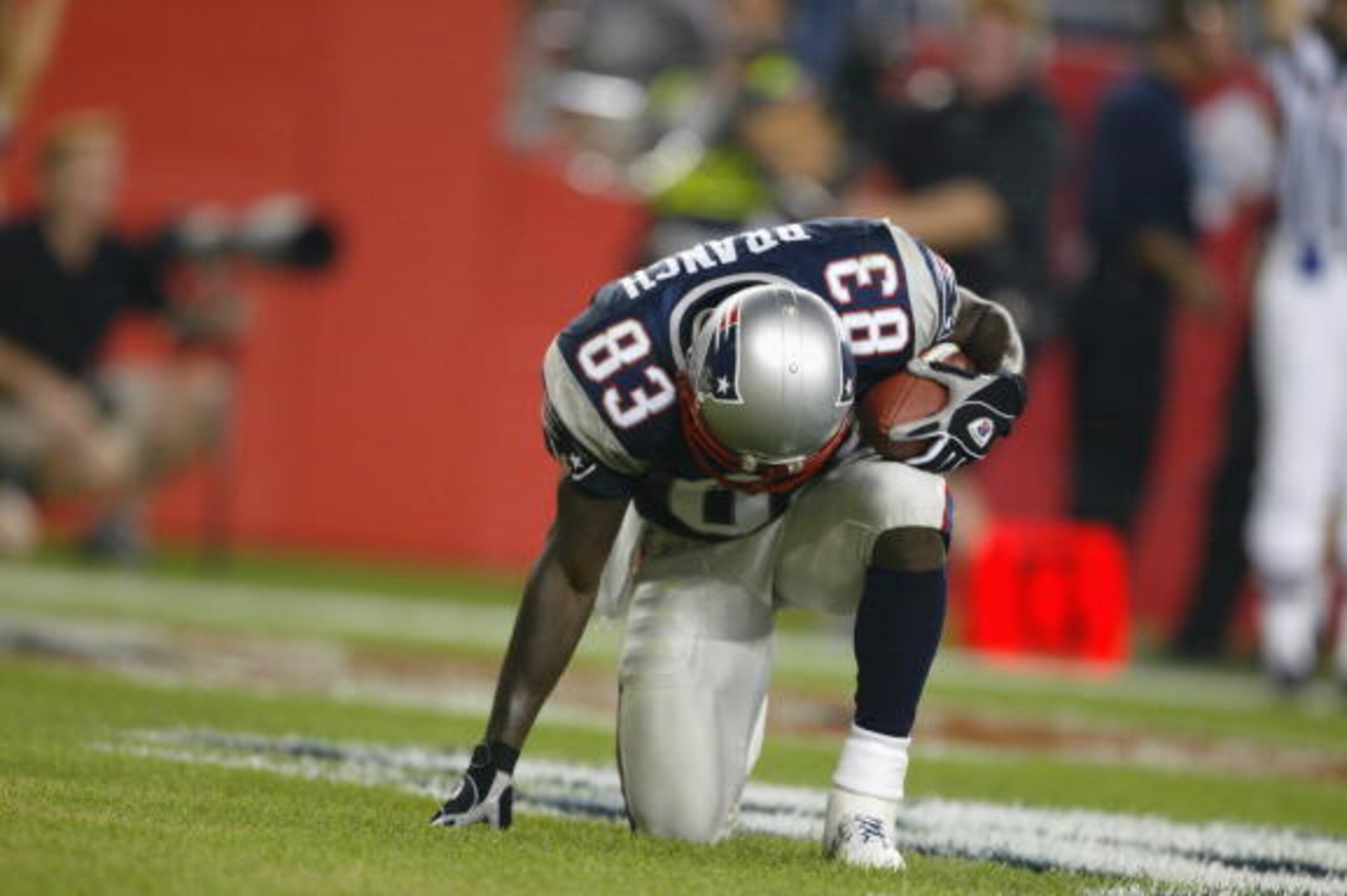 FOXBORO, MA - SEPTEMBER 9:  Deion Branch #83 of the New England Patroits reacts to his touchdown during the game against the Pittsburgh Steelers at Gillette Stadium on September 9, 2002 in Foxboro, Massachusetts. The Patroits won 31-14. (Photo by Al Bello